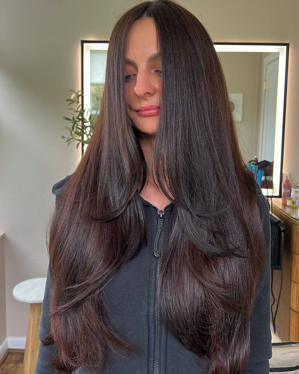 Glossy Long Layered Cut with Face-Framing Highlights