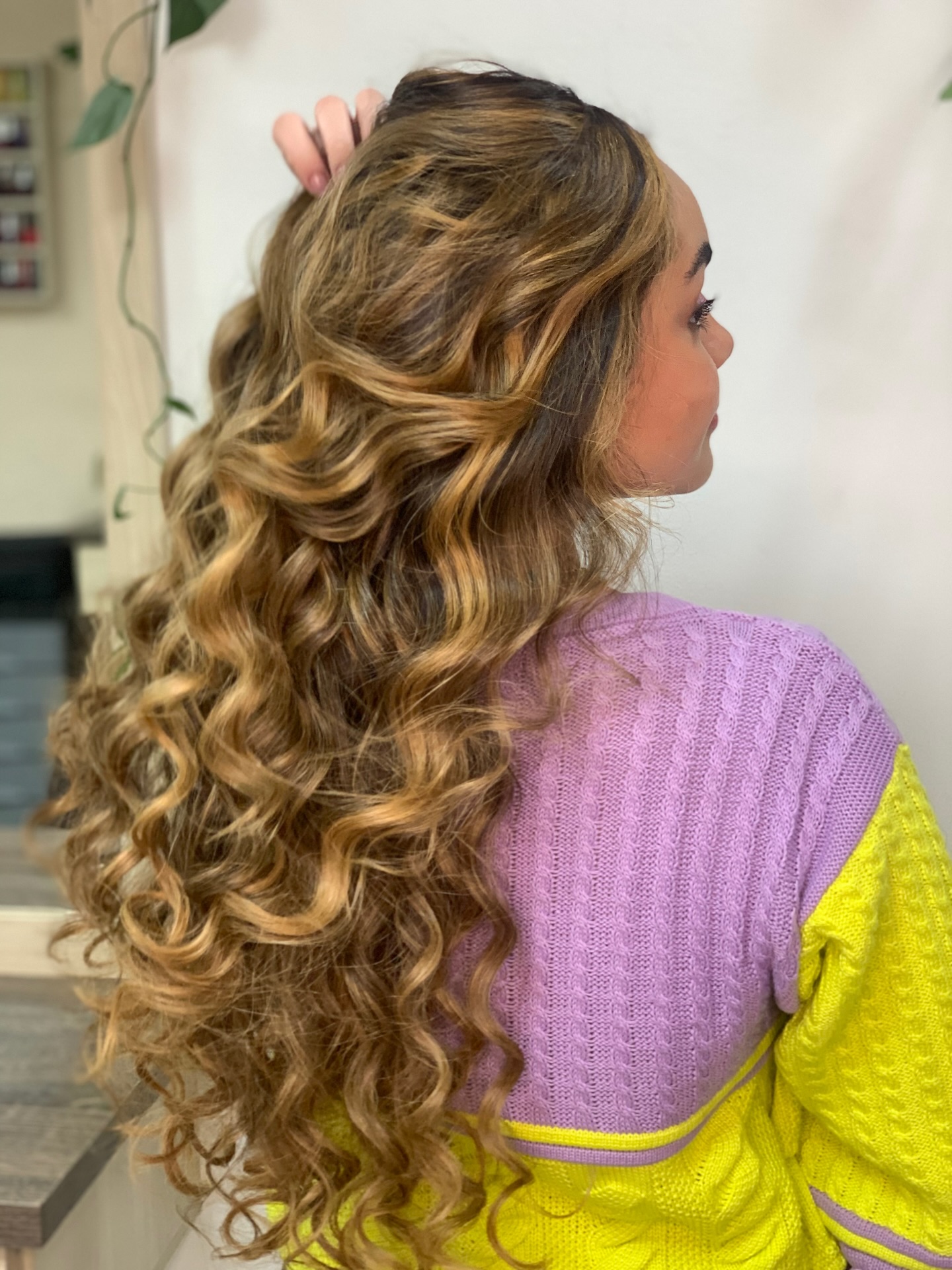 Luxurious Golden Spiral Curls with Subtle Highlights