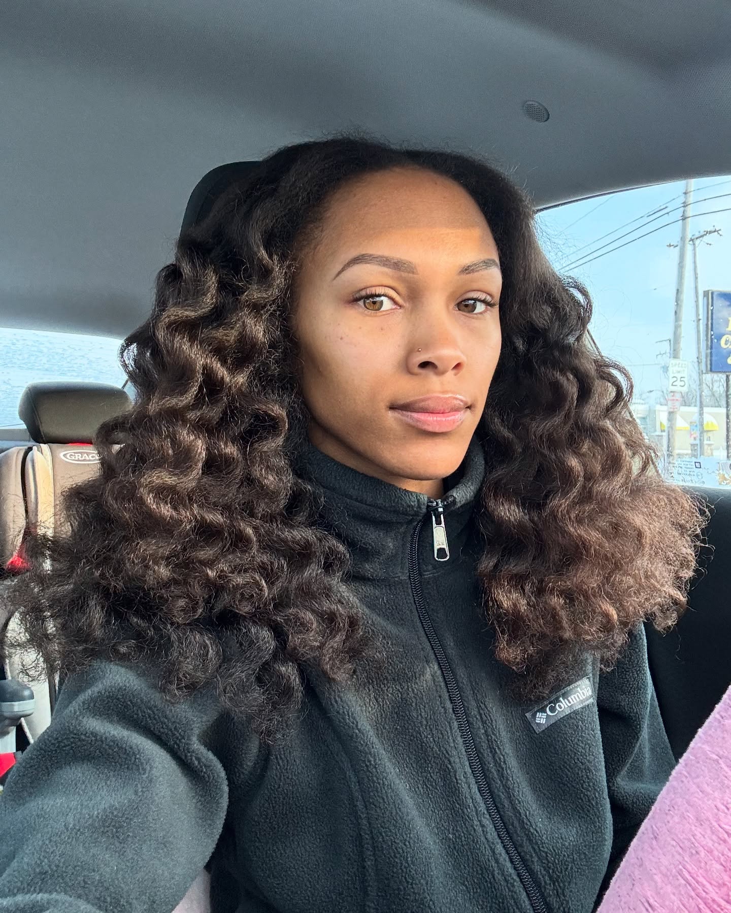 Voluminous Chestnut Curls with Natural Luster