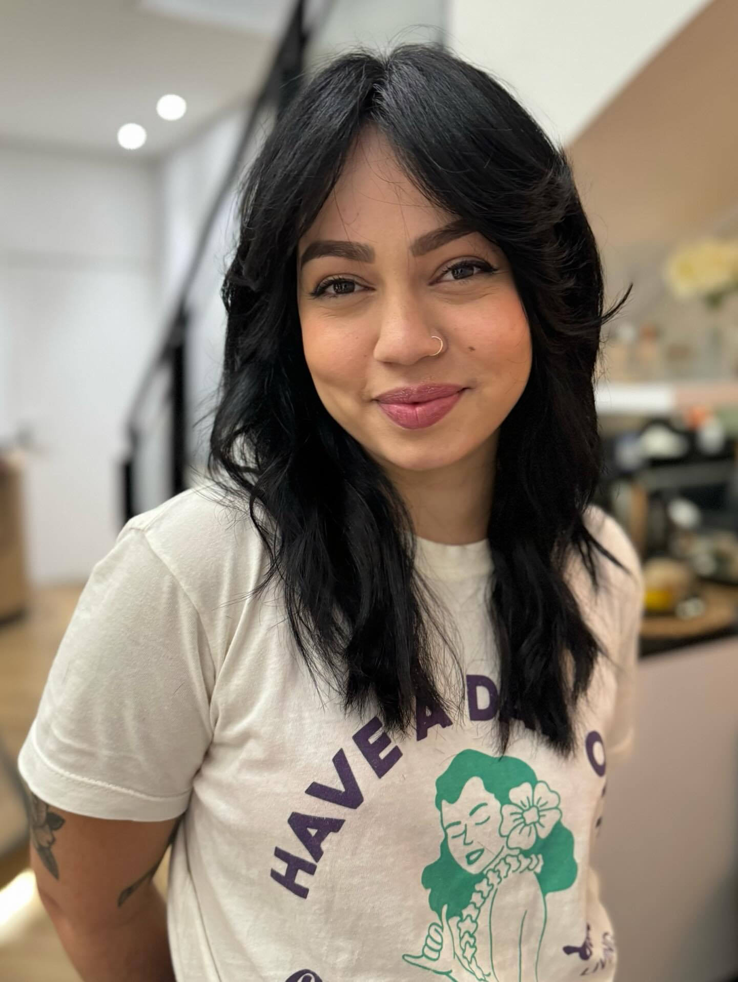 Chic Jet-Black Lob with Soft Waves and Bangs