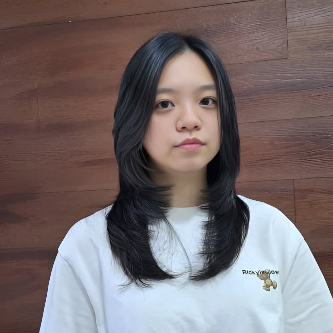 Classic Mid-Length Layered Cut with Feathered Ends