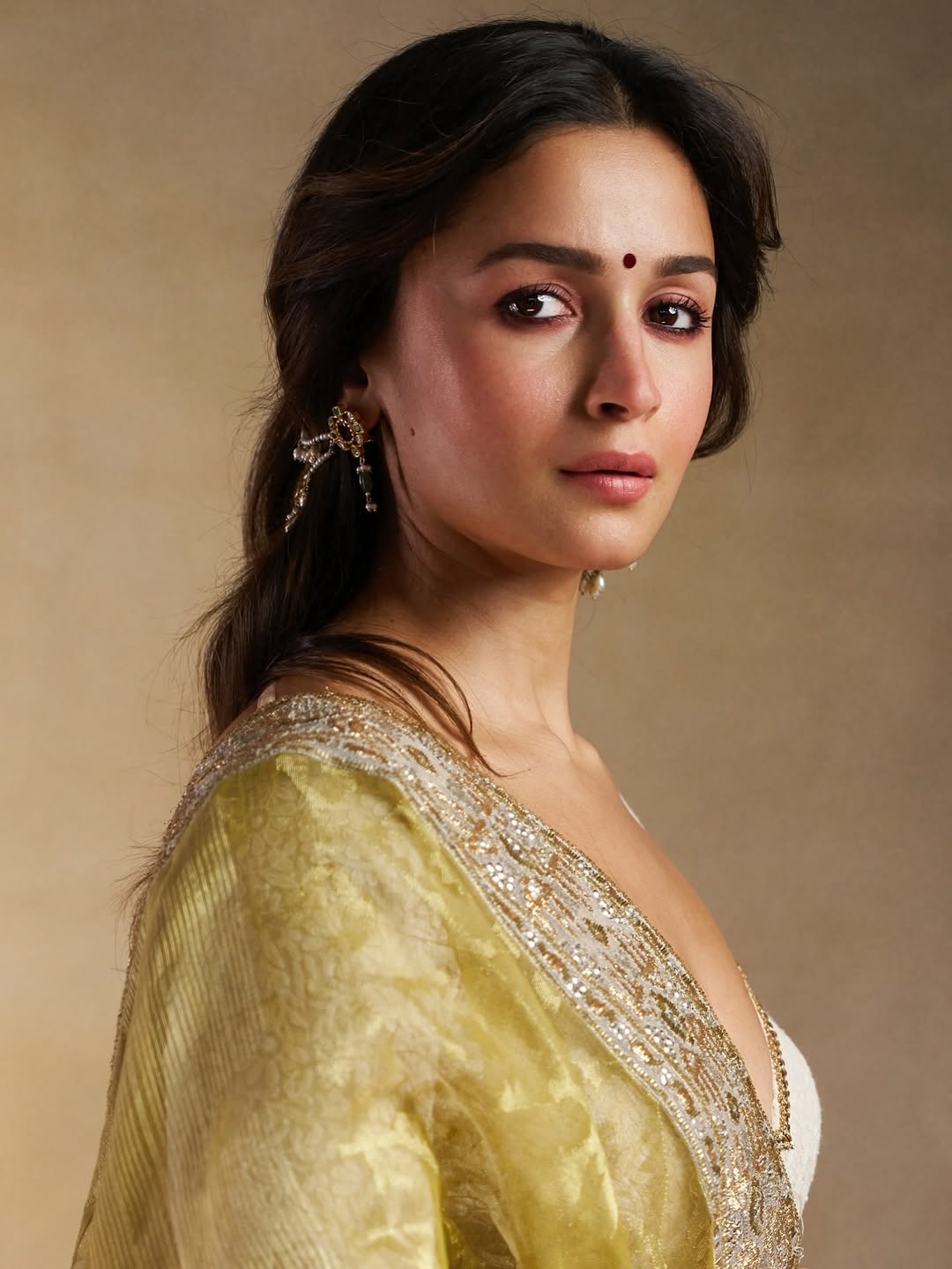 Elegant Side-Swept Low Ponytail with Soft Waves