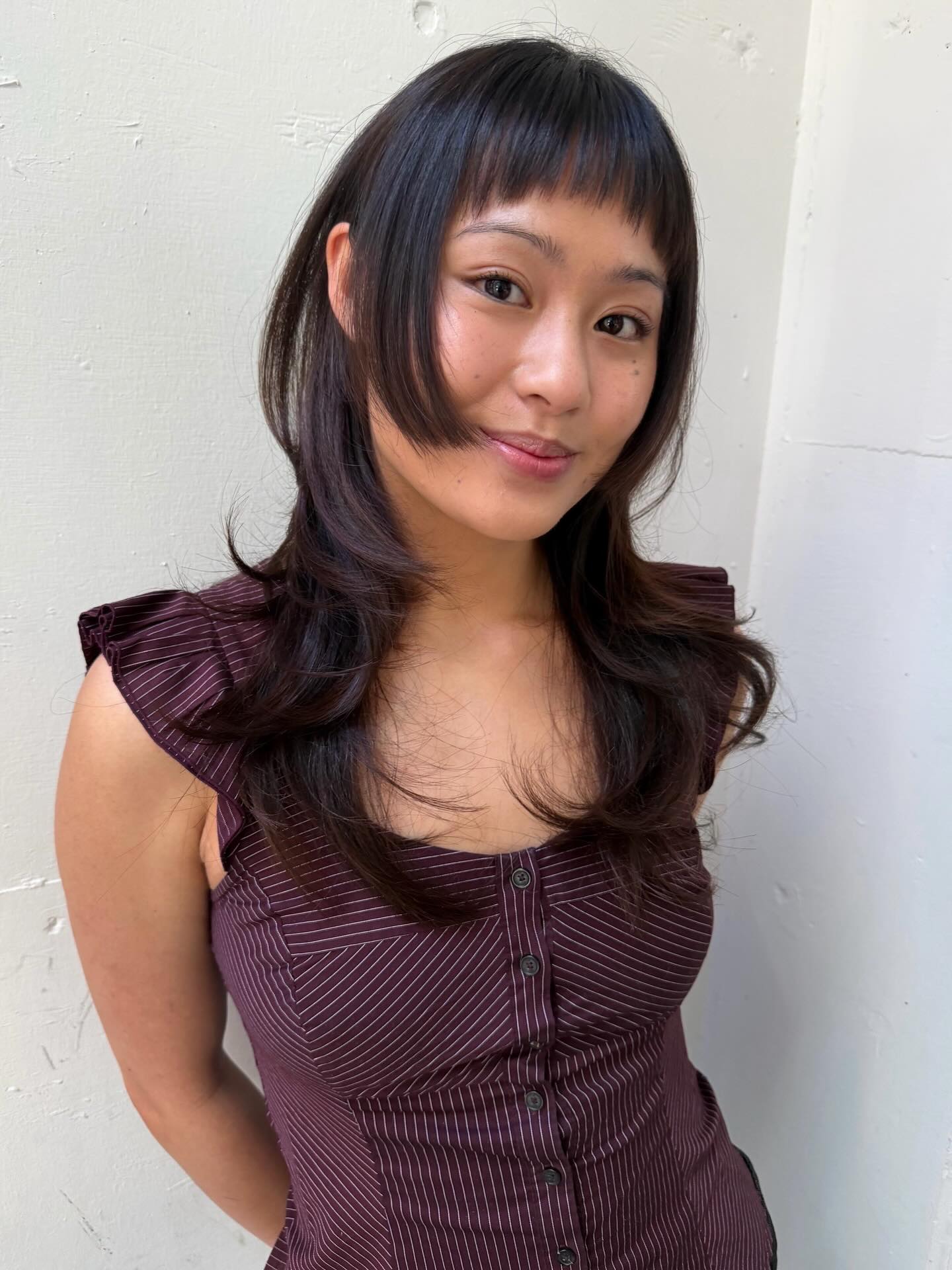 Flowing Midnight Layers with Sleek Fringe