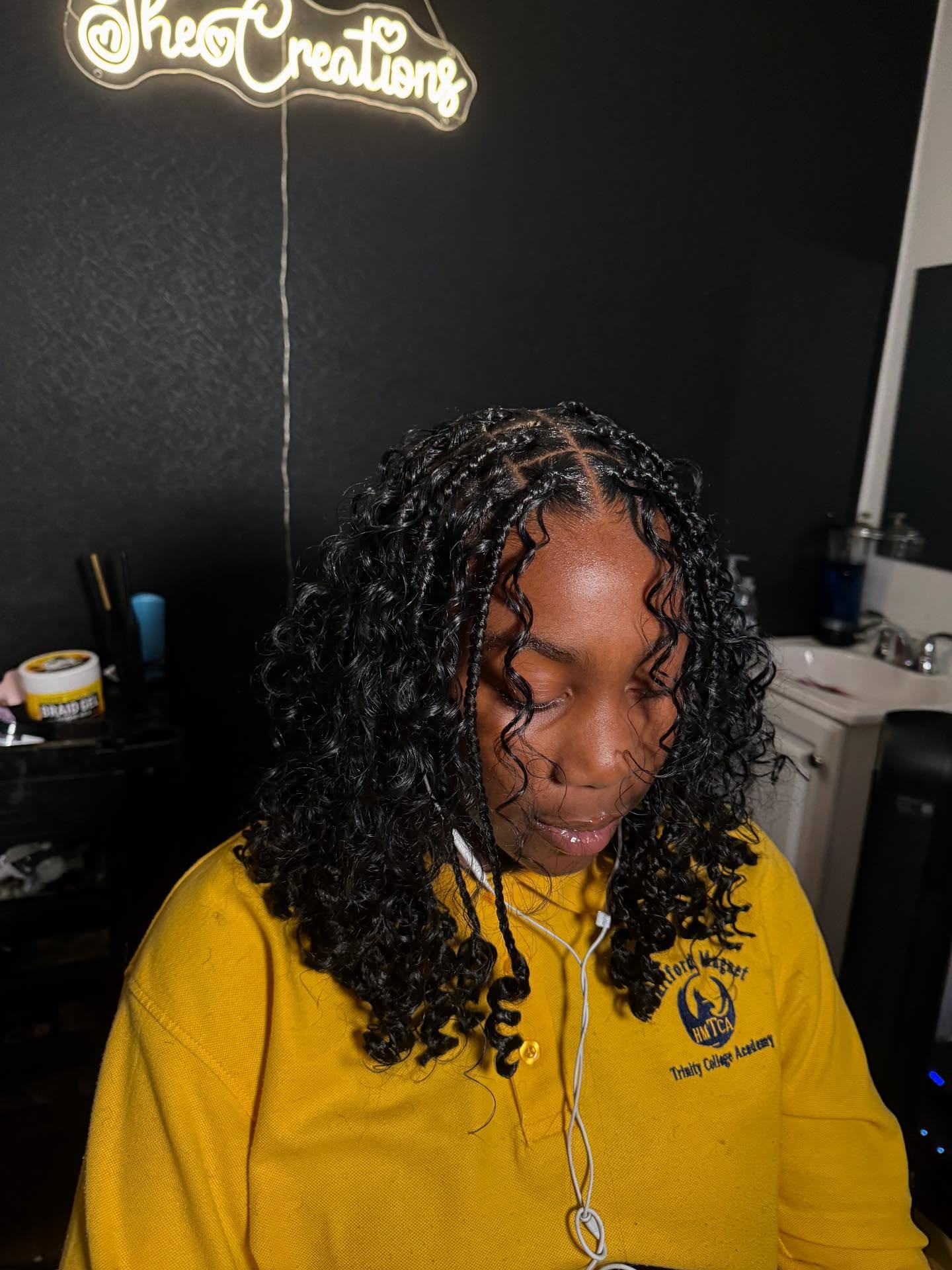 Luminous Spiral Curls with Dramatic Side-Clipped Partition