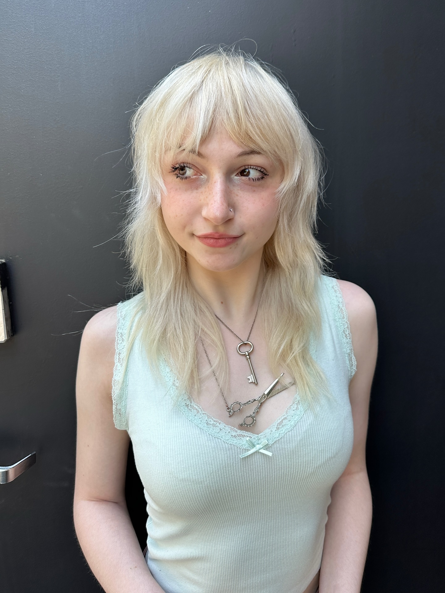 Platinum Blonde Wispy Bangs with Feathered Edges