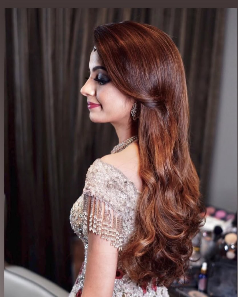 Rich Auburn Cascading Curls with Side Sweep