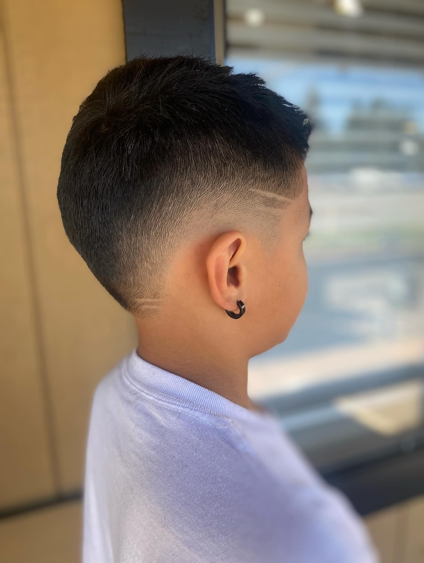 Sleek Tapered Fade with Artistic Design Detail