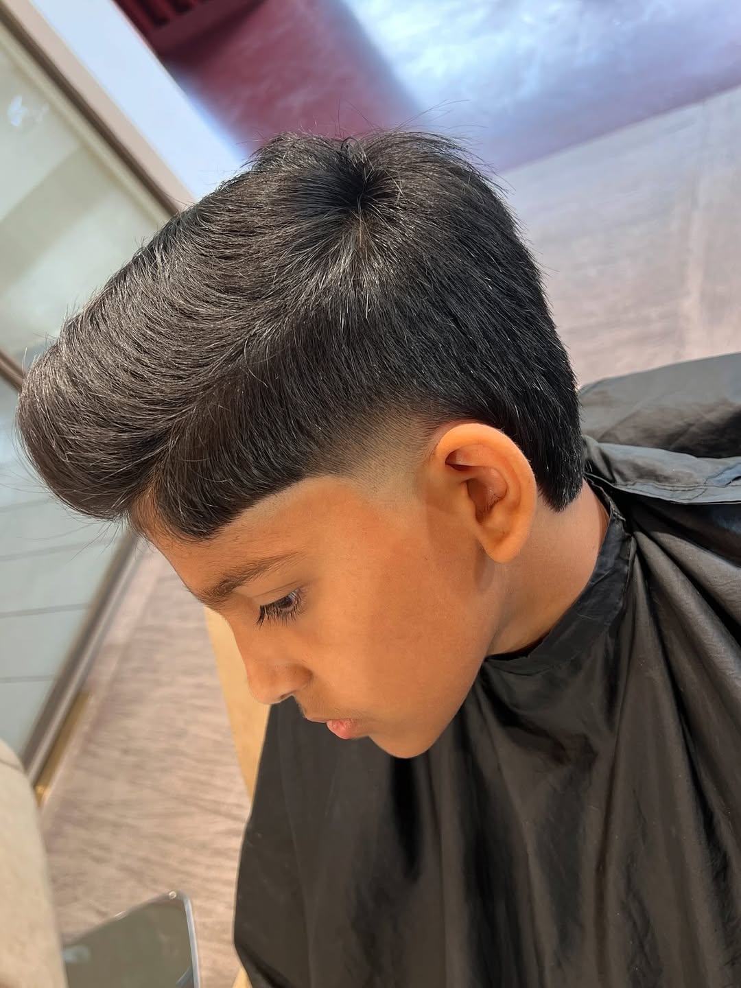 Slick Voluminous Top with Sharp Side Part