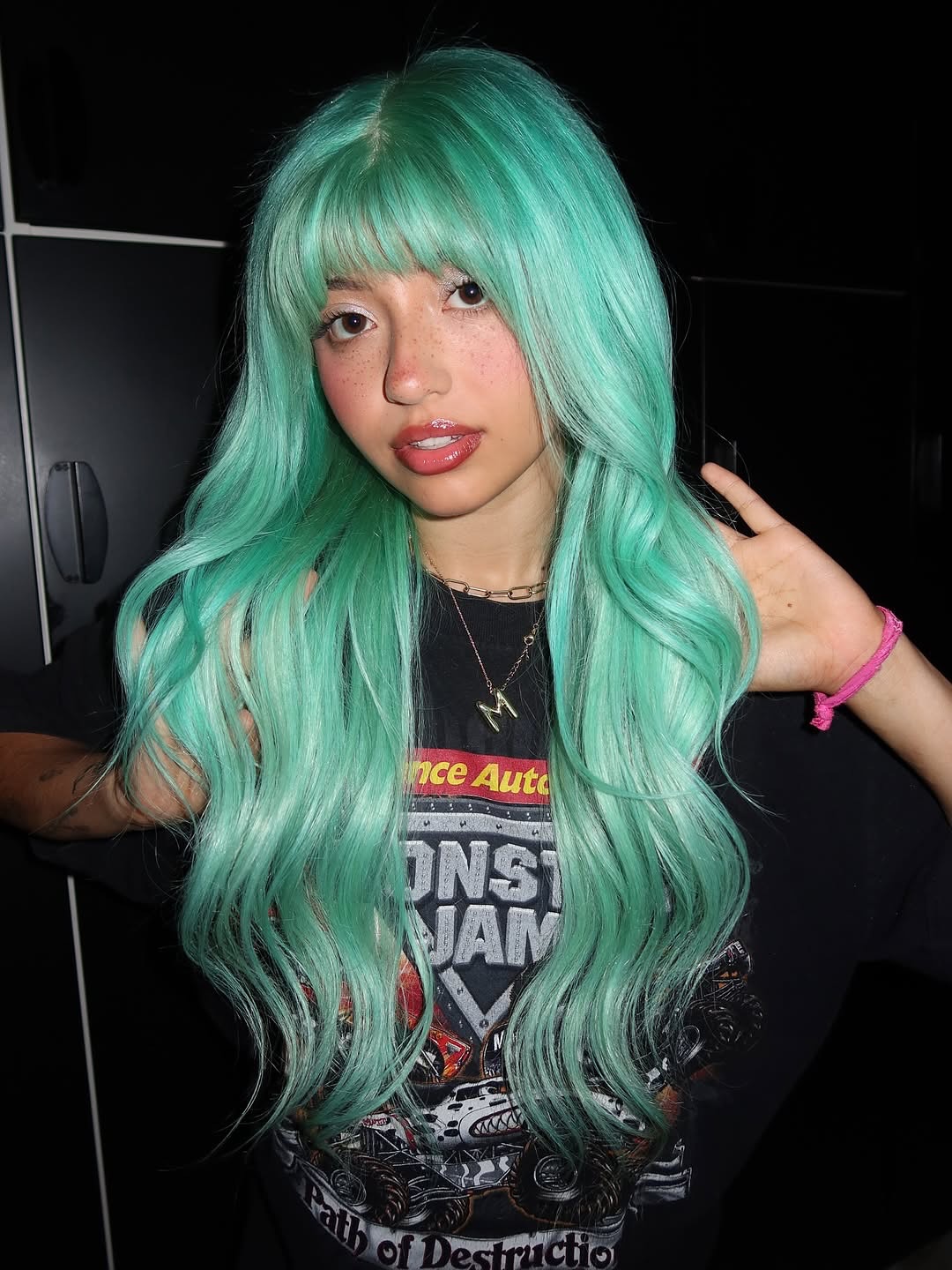 Striking Long Teal Waves with Bangs