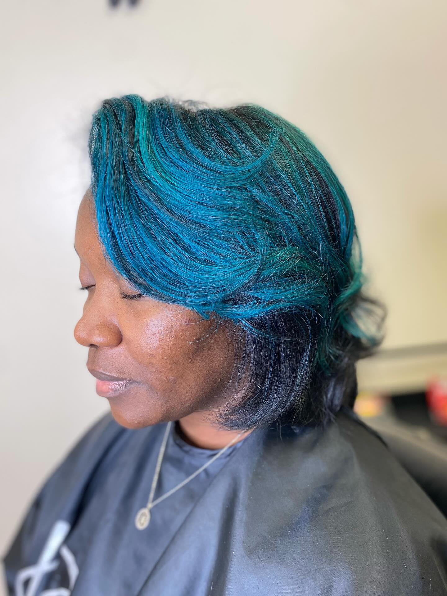 Teal-Tinted Sleek Bob with Subtle Layers