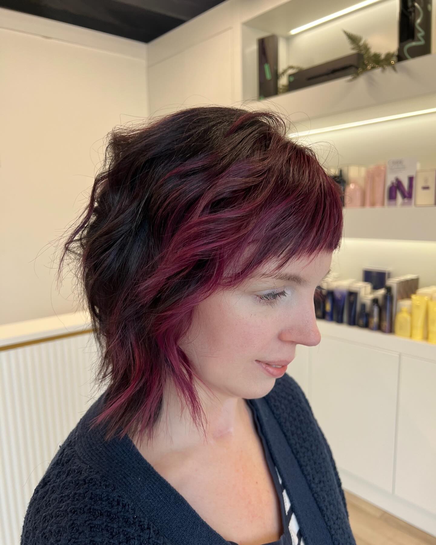 Burgundy and Black Wavy Bob with Side-Swept Bangs