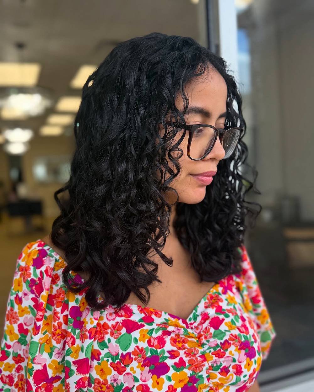 Charming Layered Curly Cut with Defined Bouncy Curls