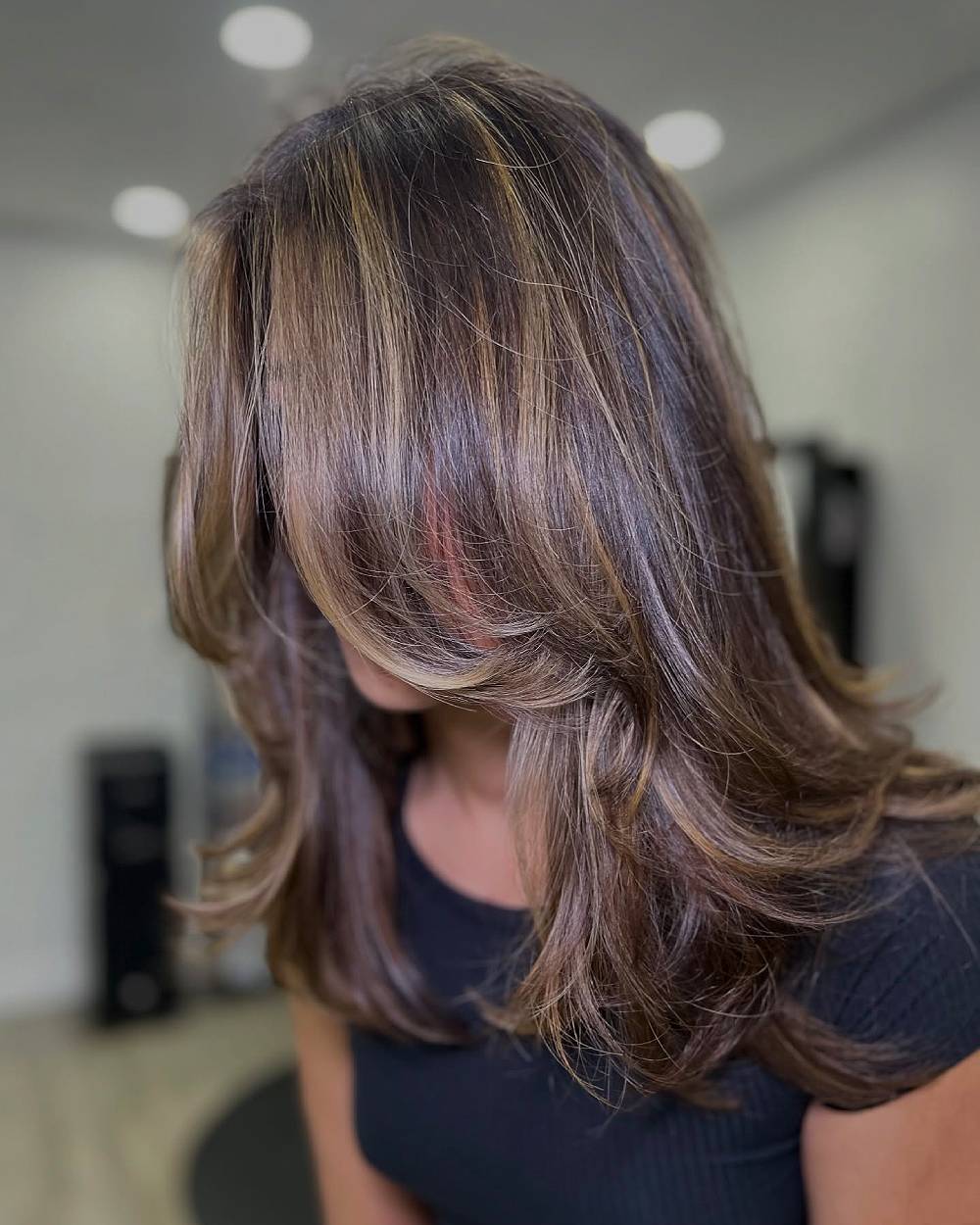 Chic Long Layered Cut with Subtle Highlights