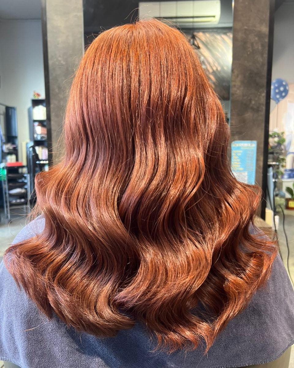 Deep Warm Auburn with Luxurious Layered Waves