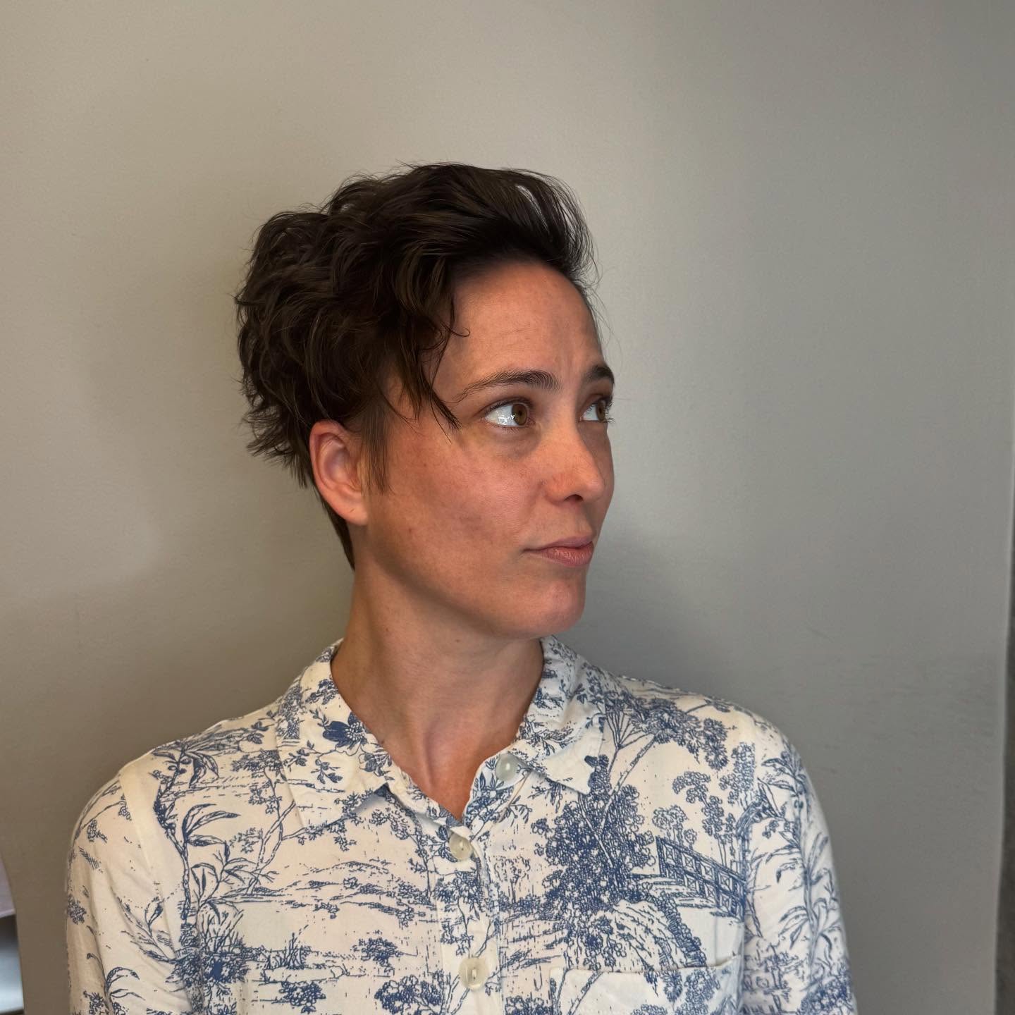 Effervescent Brunette Wavy Pixie with Tousled Top