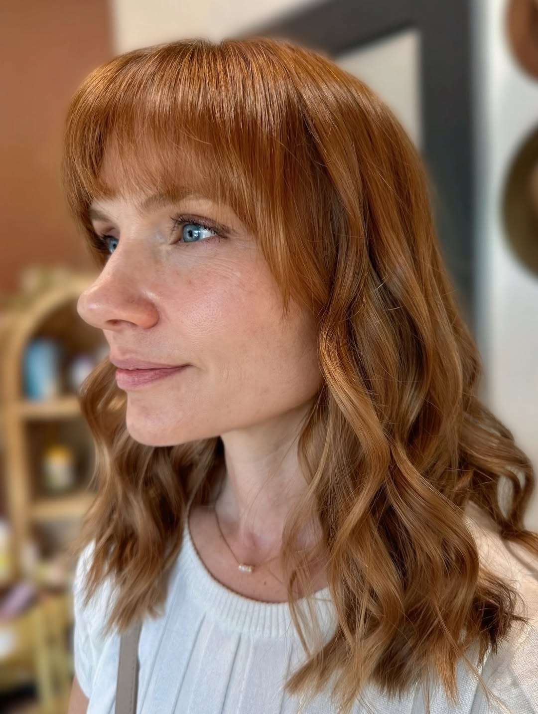 Effortless Copper Auburn Waves with Neat Bangs