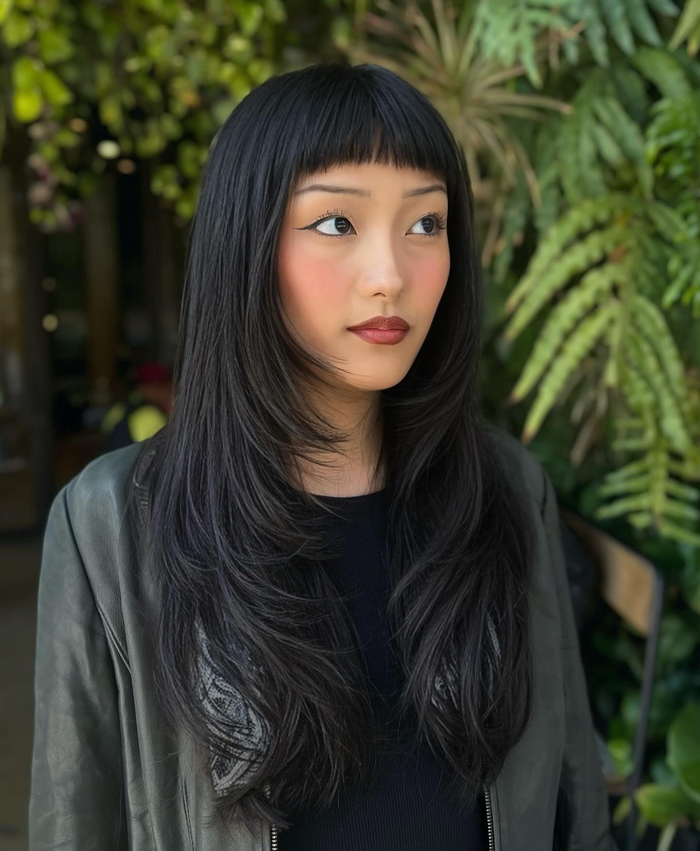 Glossy Ebony Flow with Dramatic Baby Bangs