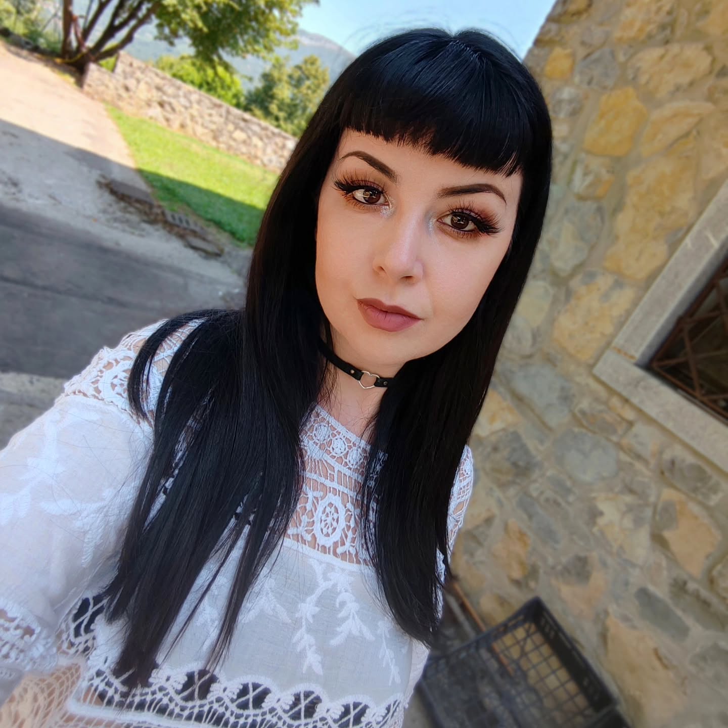 Jet-Black Sleek Hair with Sharp Baby Bangs
