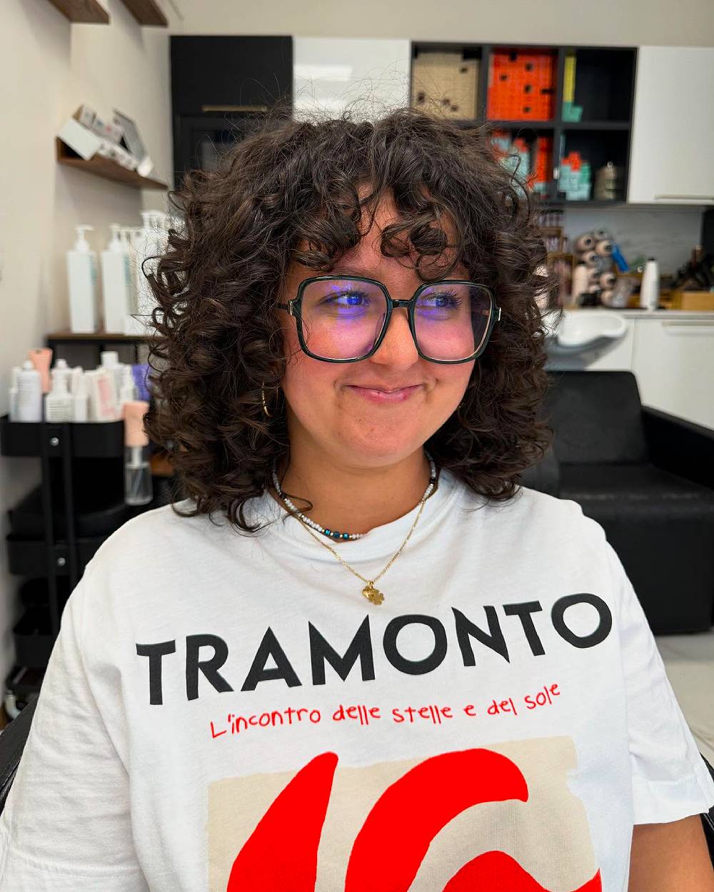 Layered Curly Cut with Soft Face-Framing Curls