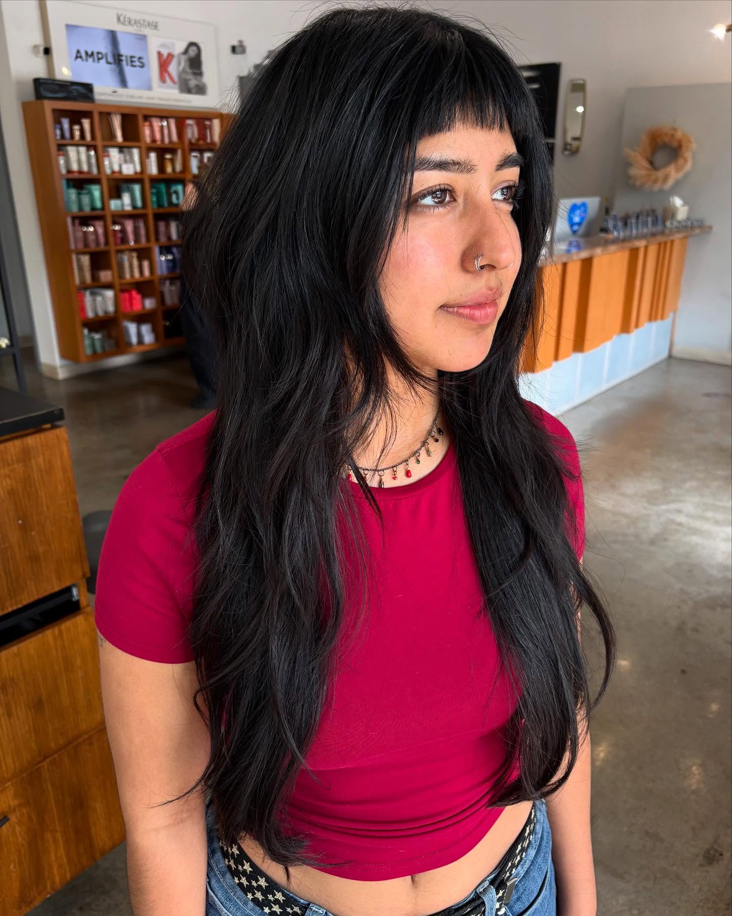 Lustrous Black Layers with Textured Baby Bangs