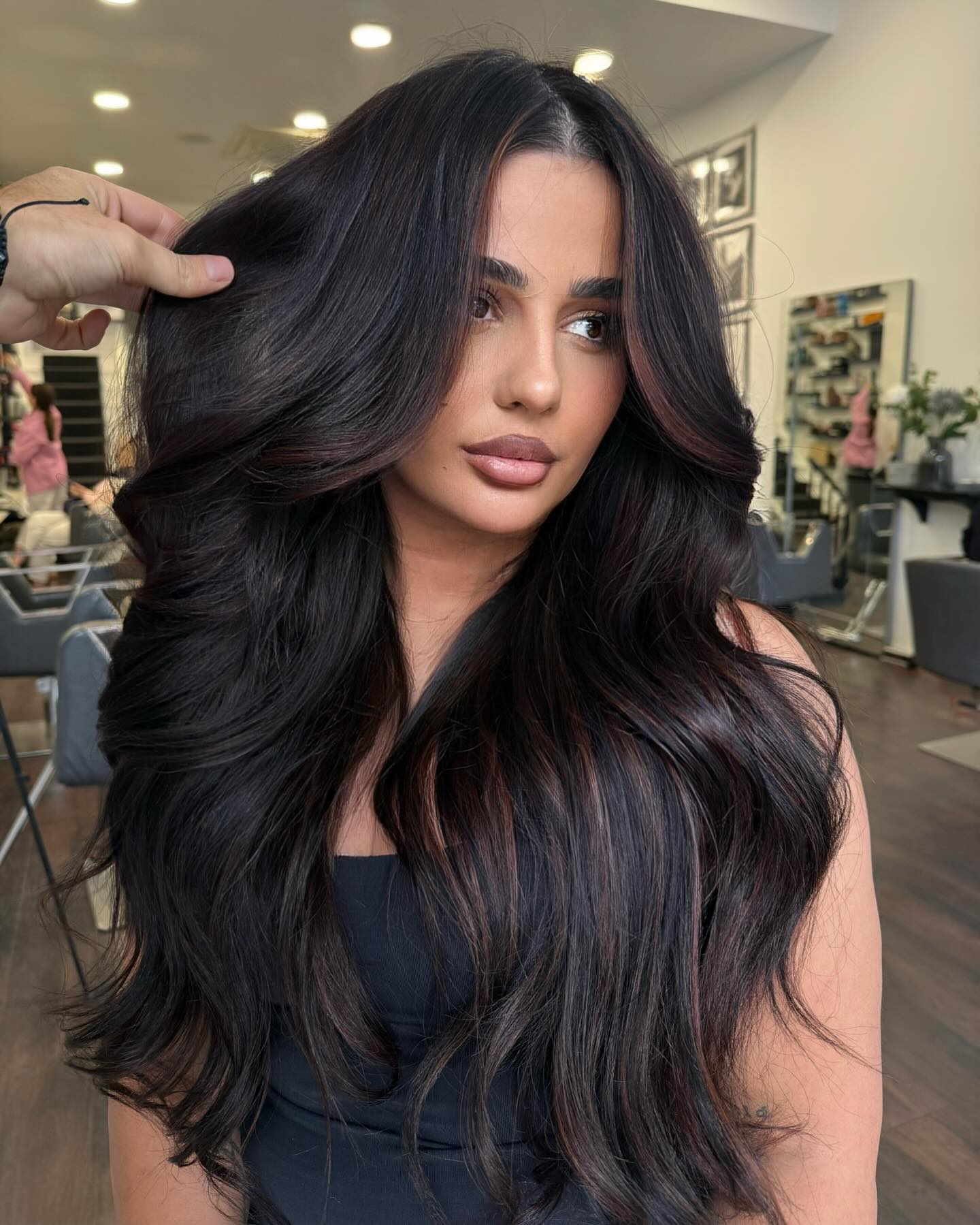 Lustrous Ebony Waves with Subtle Highlights