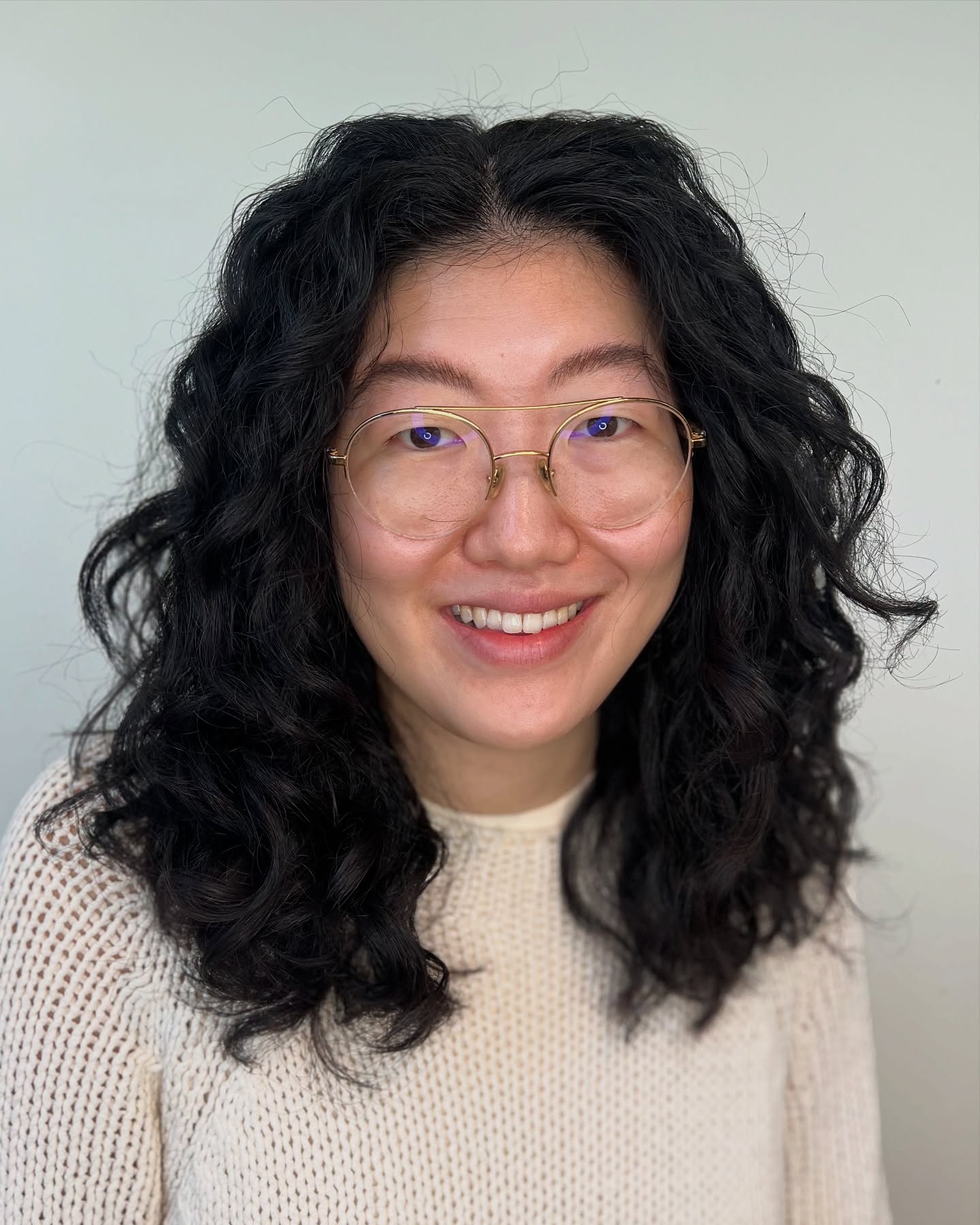 Natural Voluminous Black Curls with Glasses