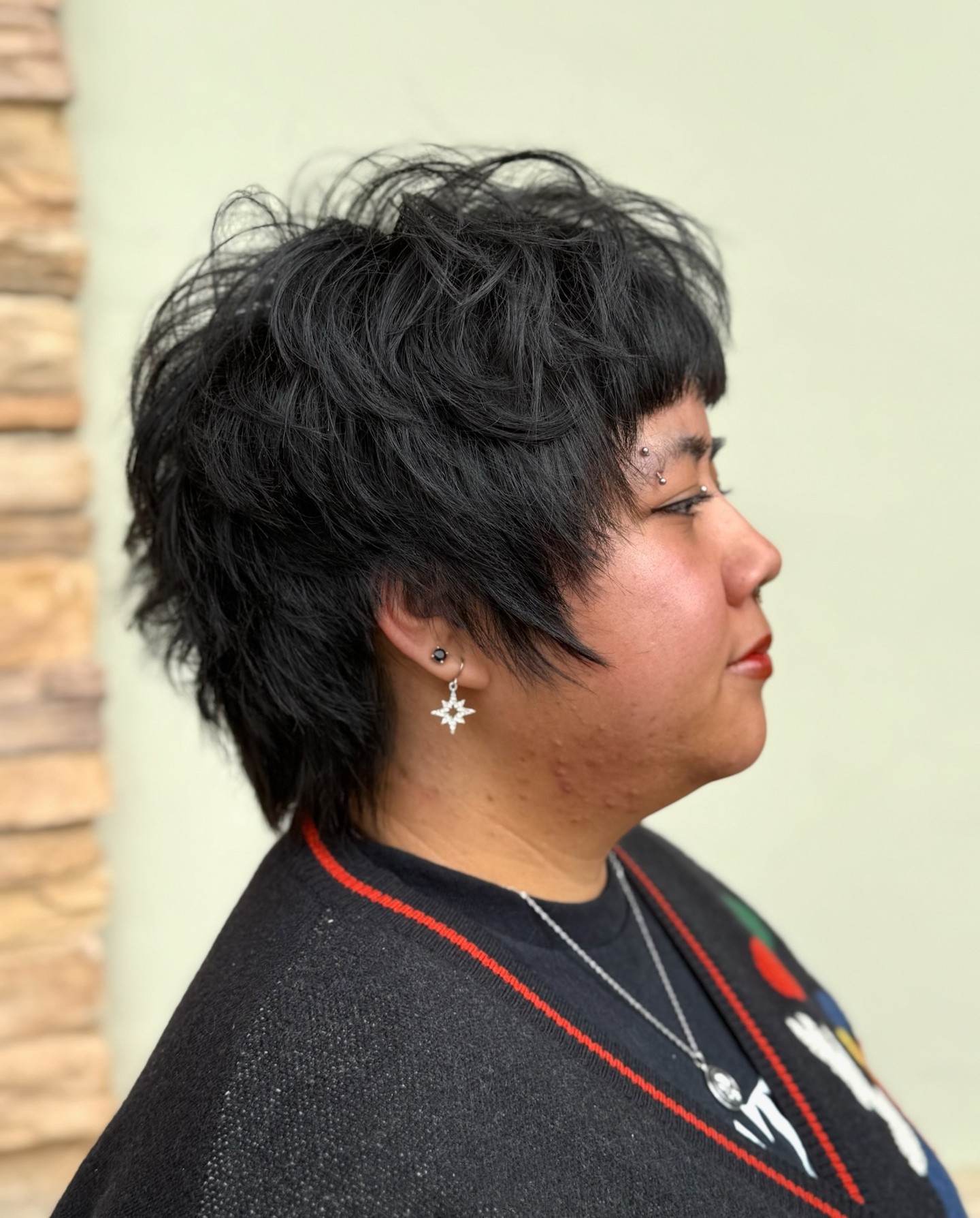 Sharp Black Textured Pixie with Angular Fringe