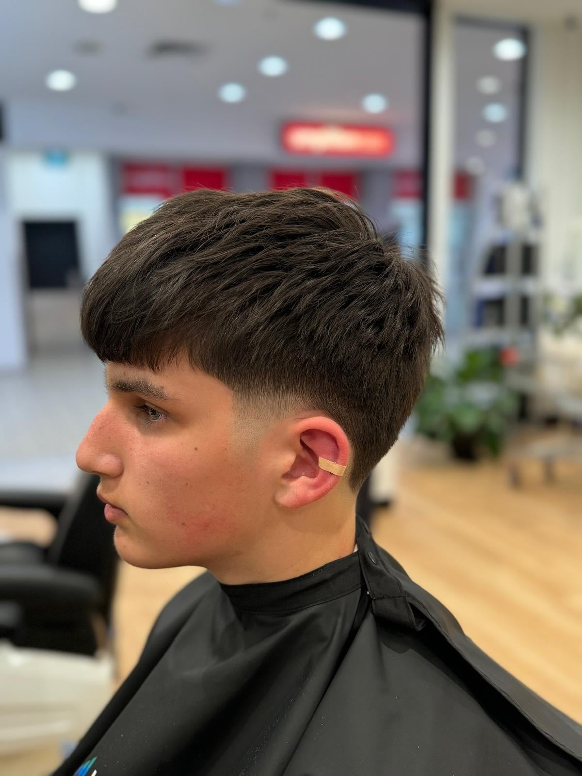 Sleek Angled Fringe with Tapered Neckline