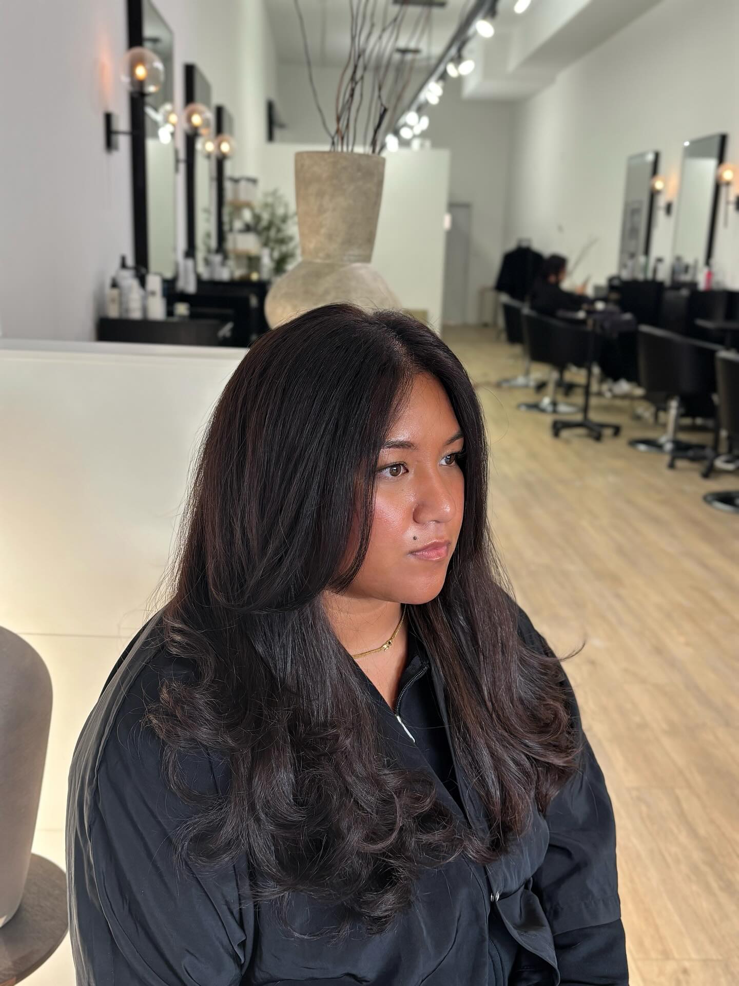 Sleek Chestnut Waves with Soft Layering