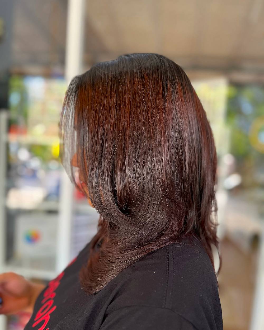 Sleek Mid-Length Cut with Subtle Layers