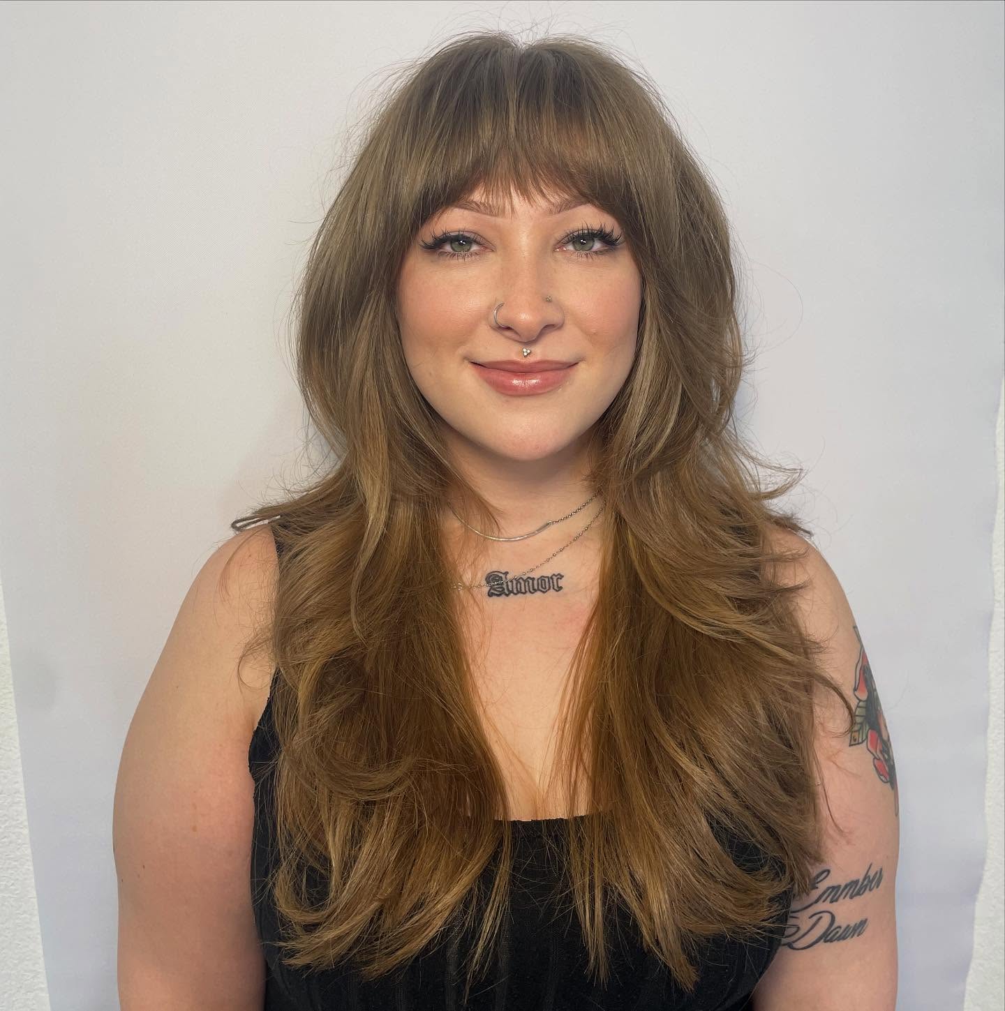 Soft Tousled Layers with Curtain Bangs