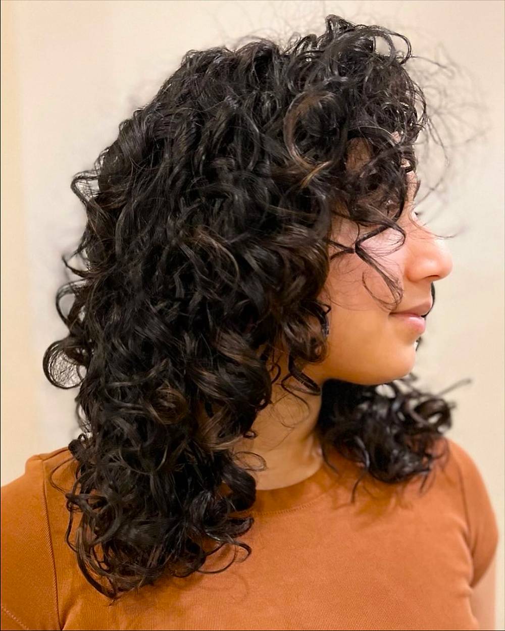 Stylish Layered Curly Cut with Defined Curls