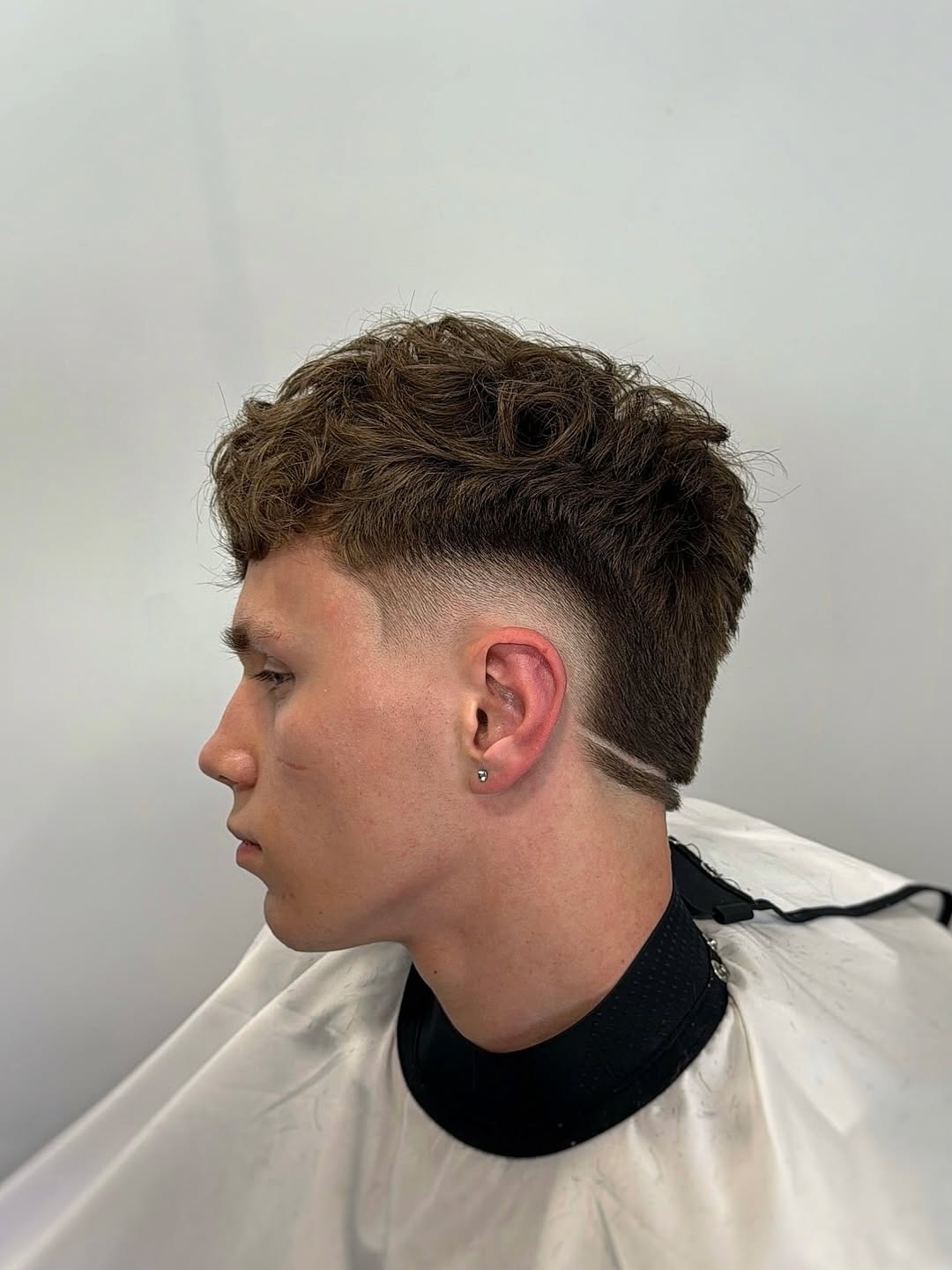 Textured Curly Top with Razor-Sharp Fade