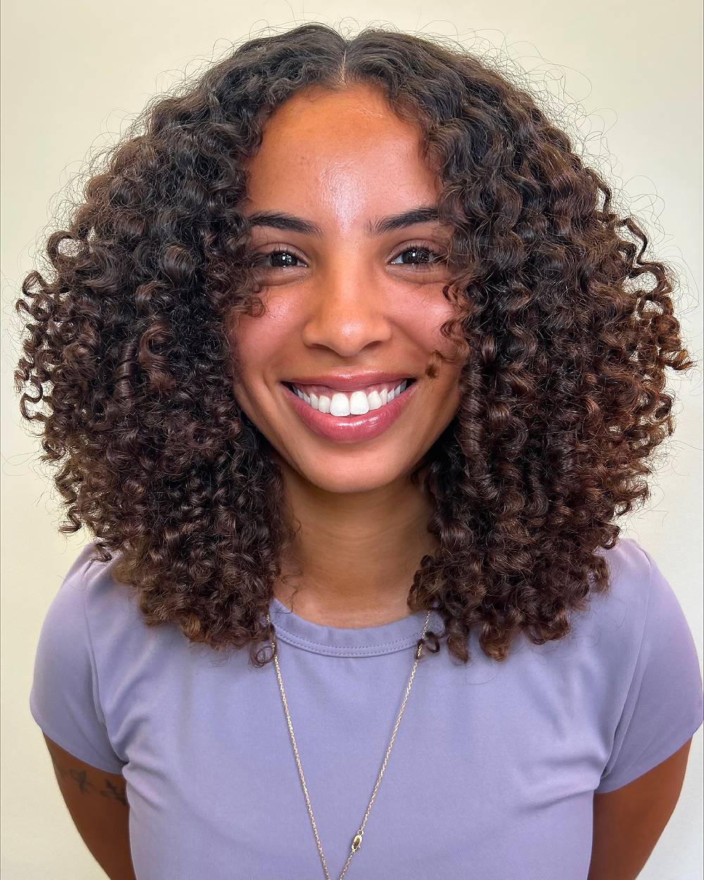 Textured Layered Curly Cut for Defined Volume
