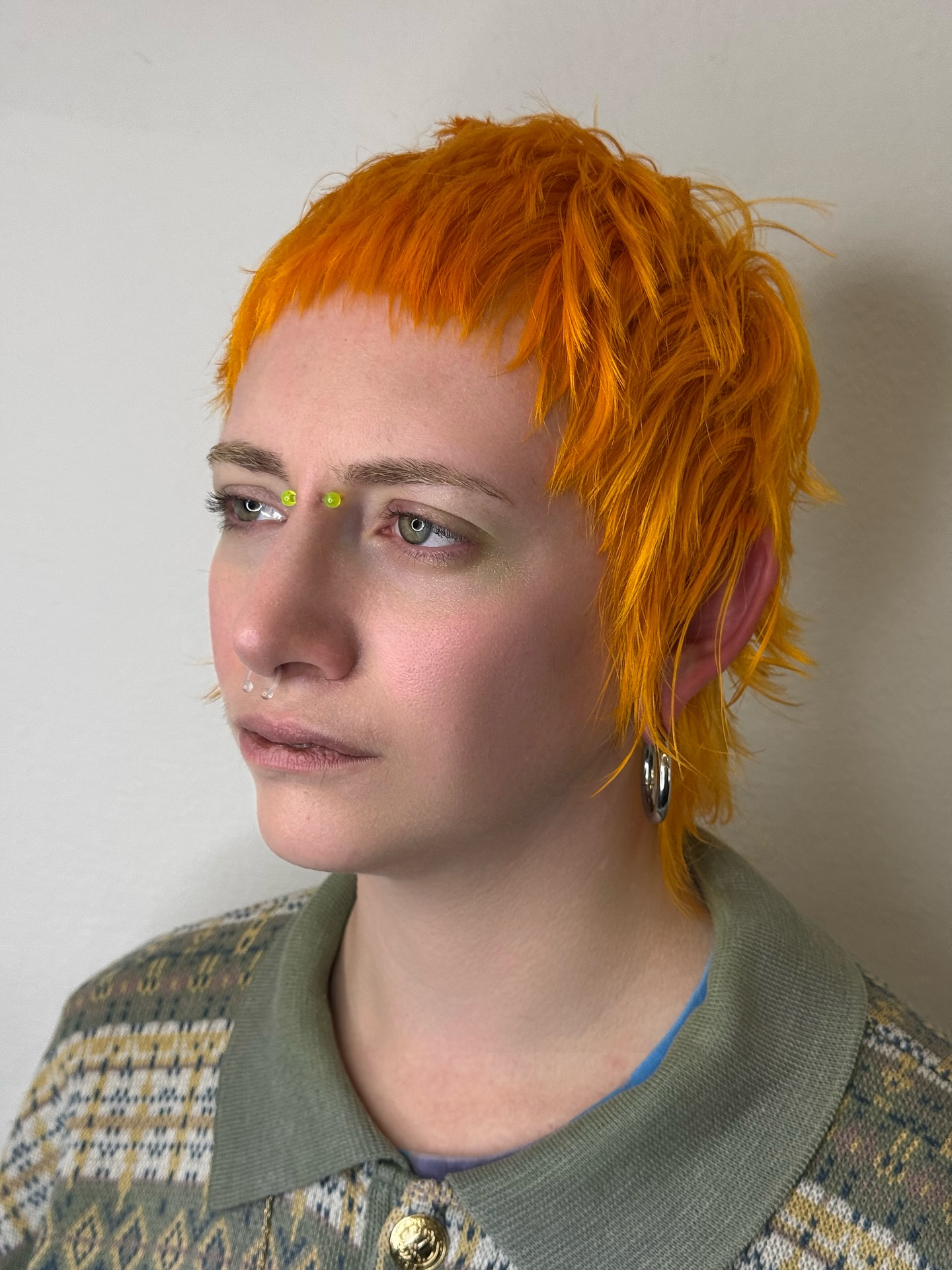 Vibrant Tangerine Tousled Pixie Cut