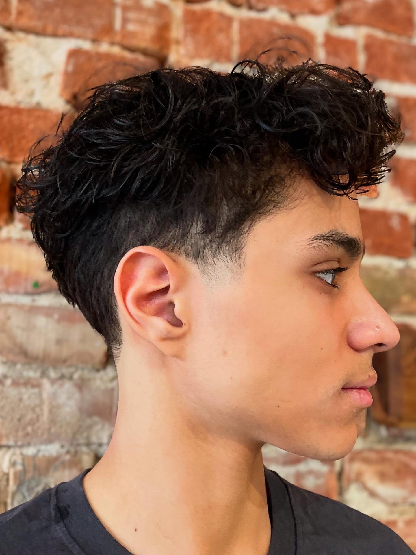 Voluminous Curly Top with Natural Taper