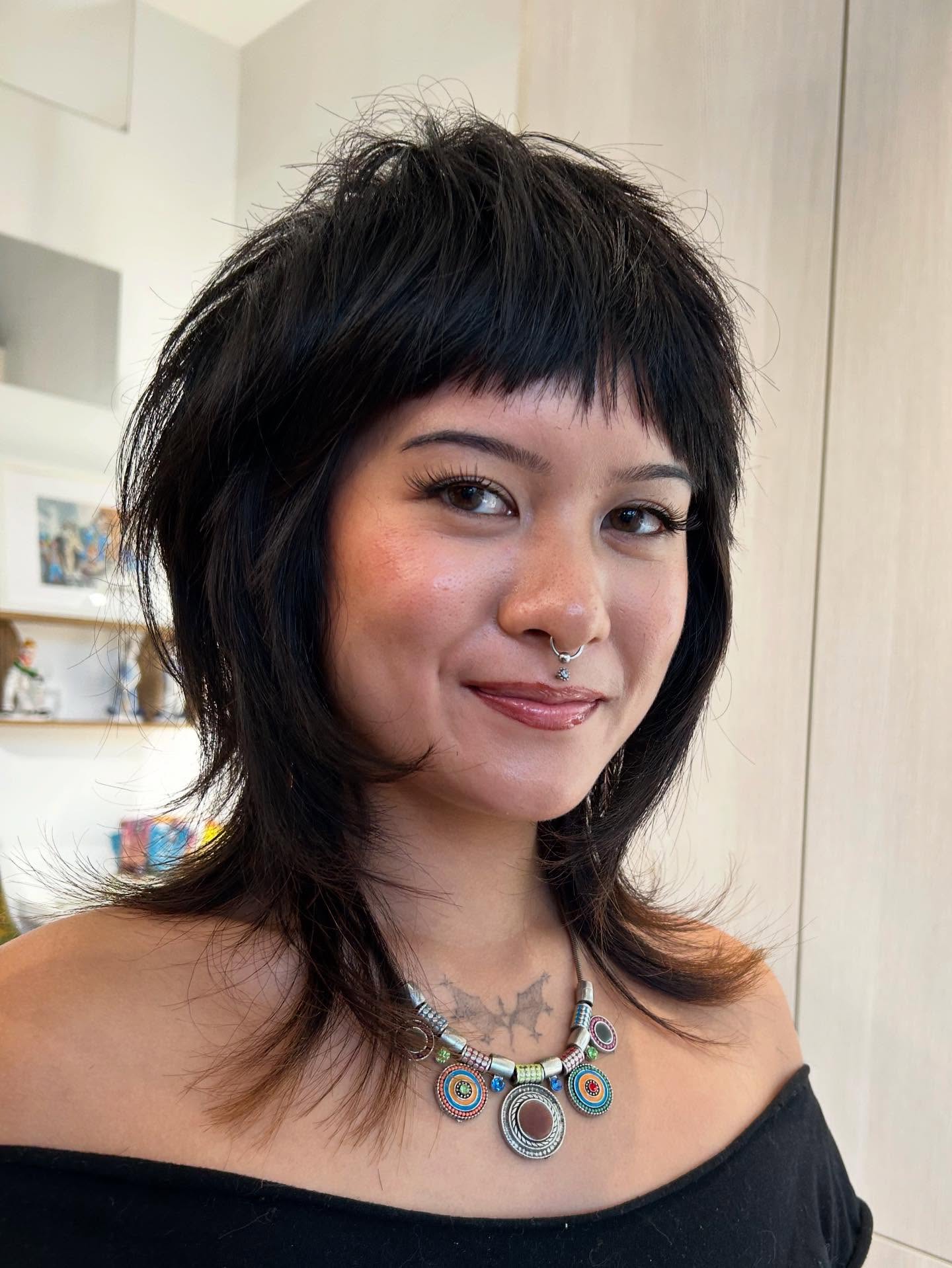 Asymmetrical Choppy Layered Bob with Fringe