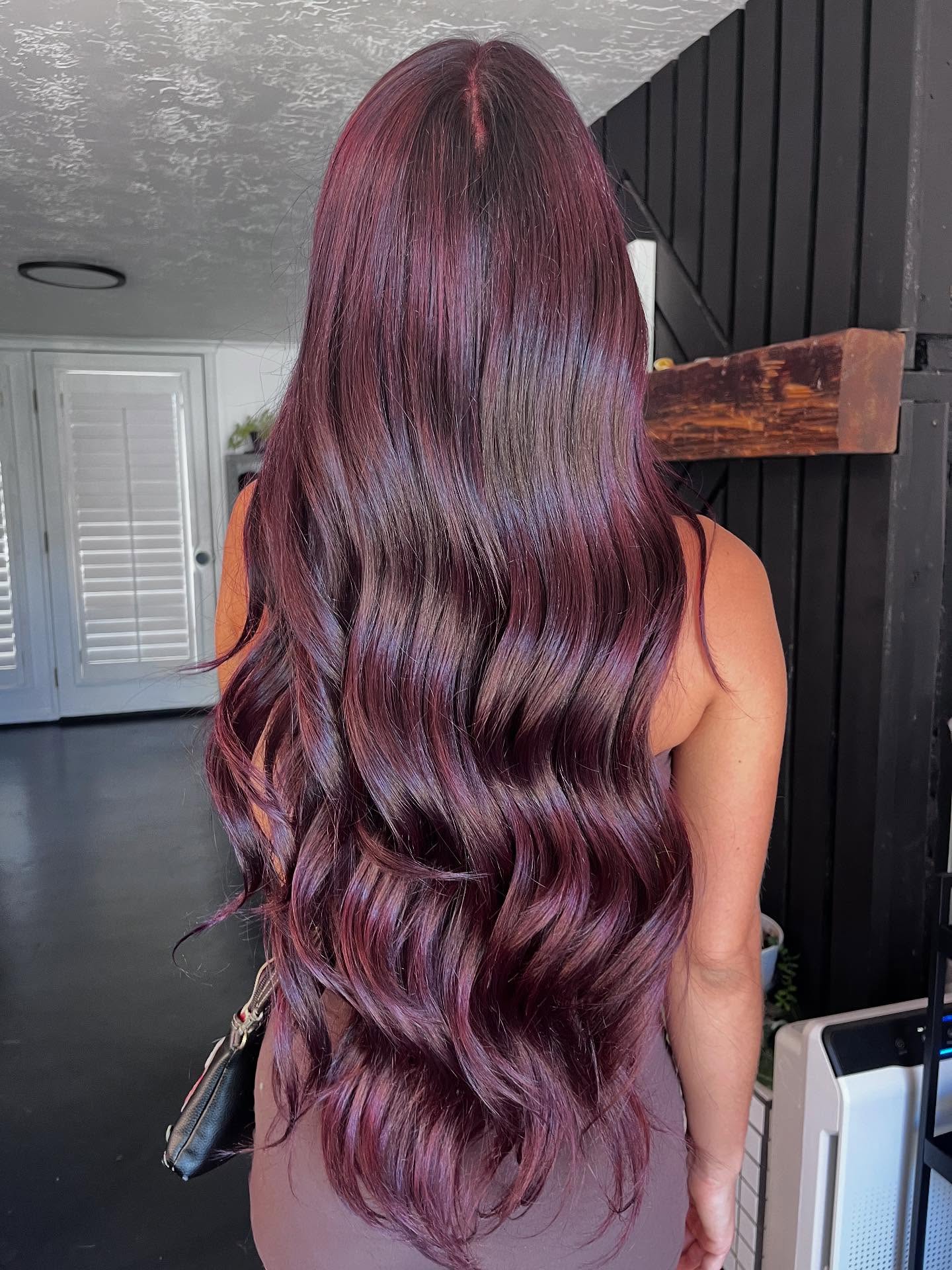 Captivating Long Red Cherry Curls with Subtle Layering