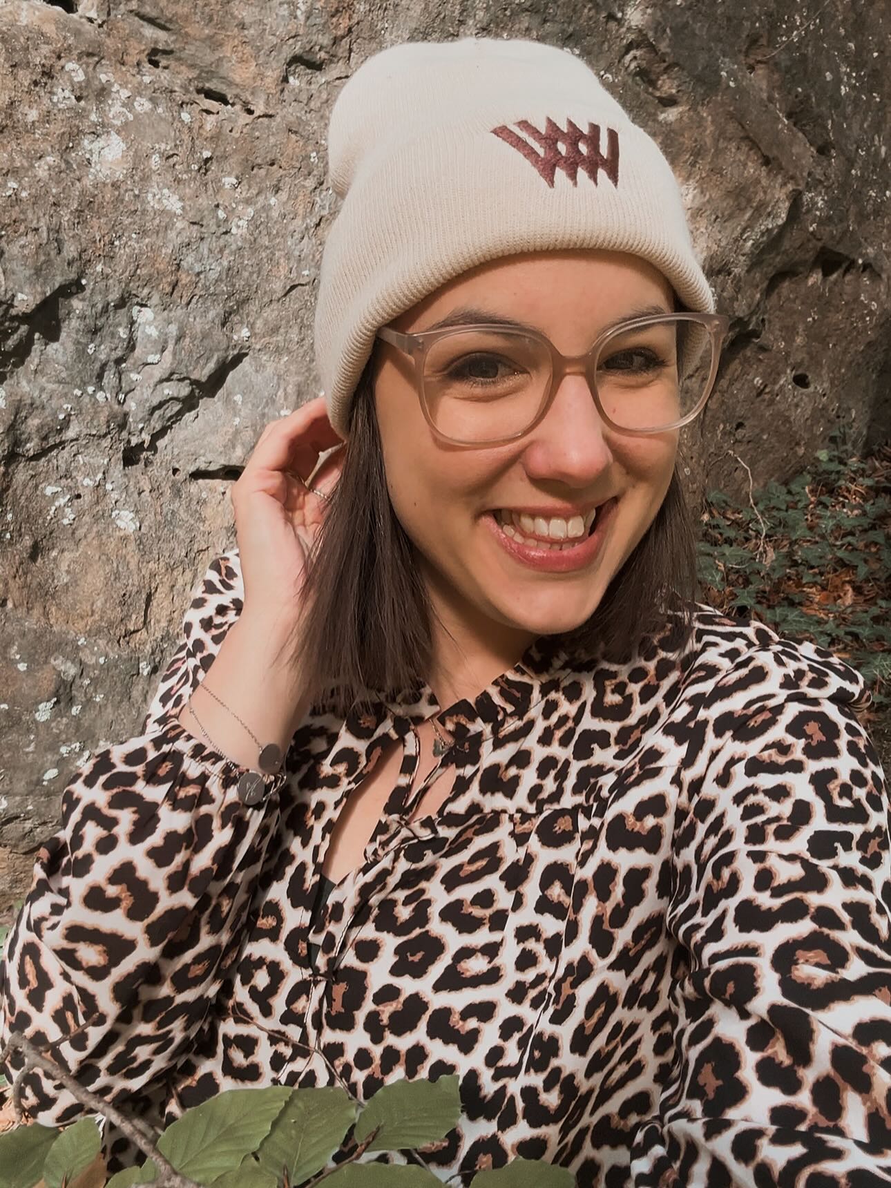 Chic Brunette Lob with Caramel Highlights Under Cream Beanie