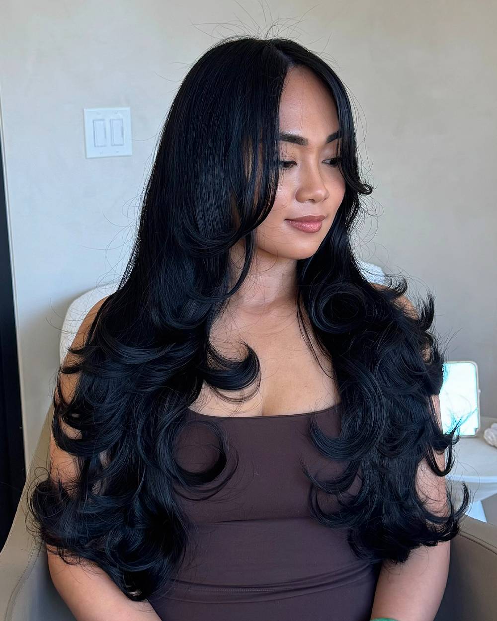 Elegant Long Layered Cut with Soft Curls