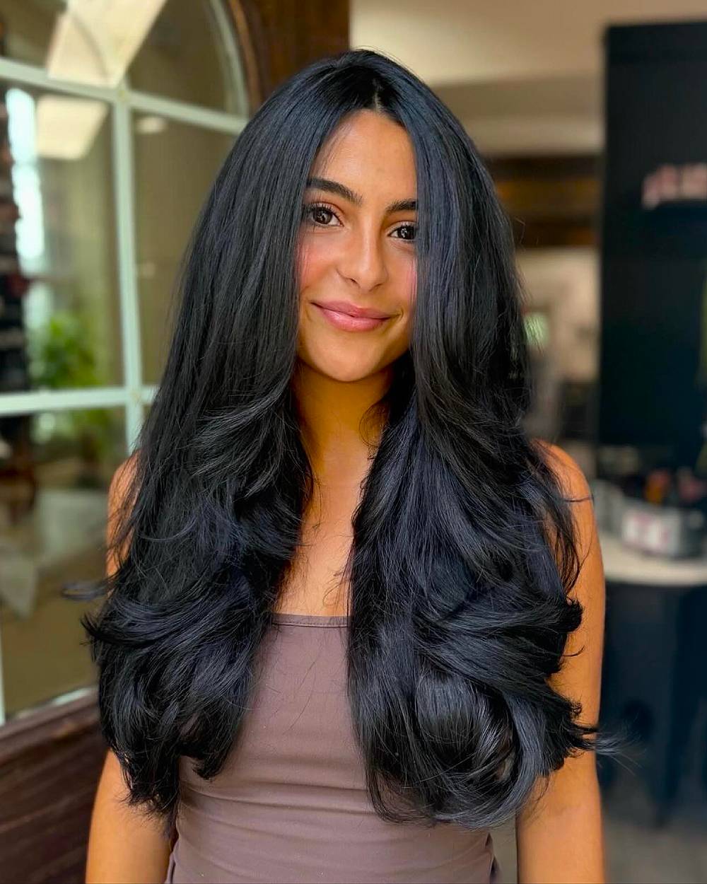 Glamorous Long Layered Cut with Voluminous Waves