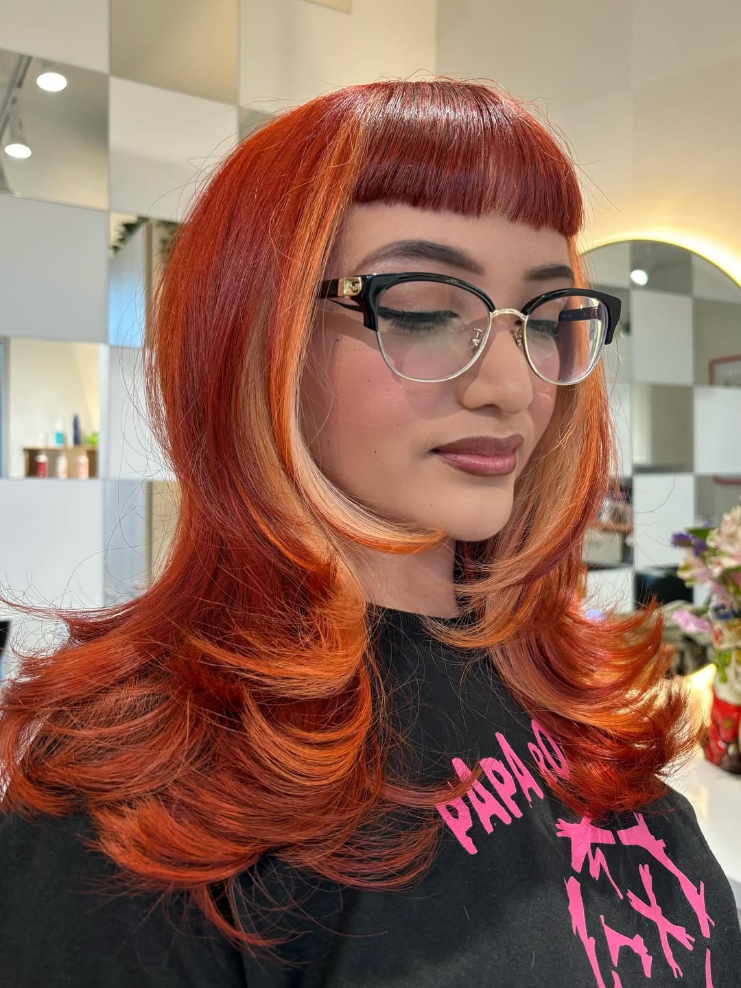 Glossy Copper Bob with Soft Waves and Full Fringe