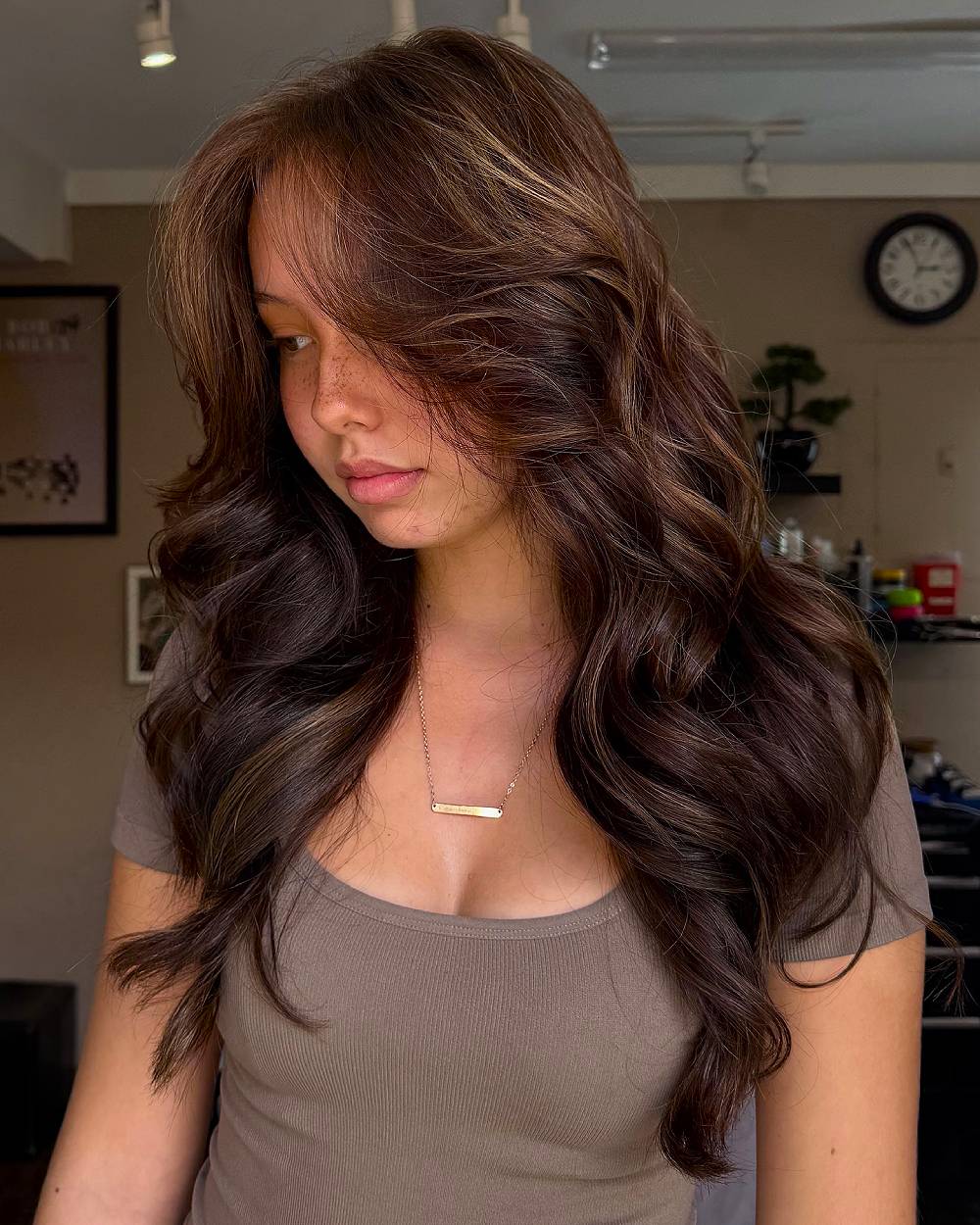 Gorgeous Long Layered Cut with Sun-Kissed Highlights