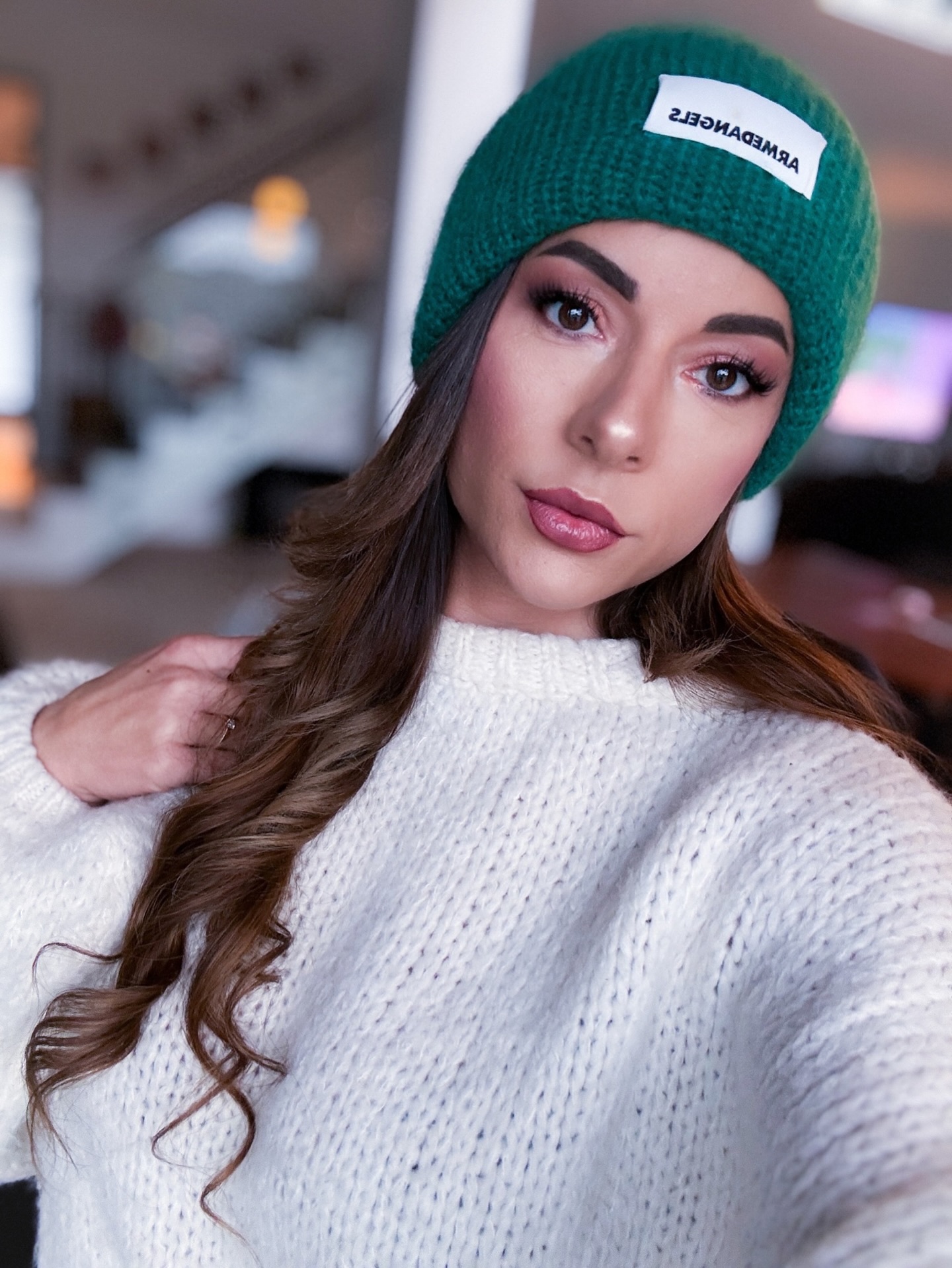 Long Cascading Curls with Emerald Knit Beanie