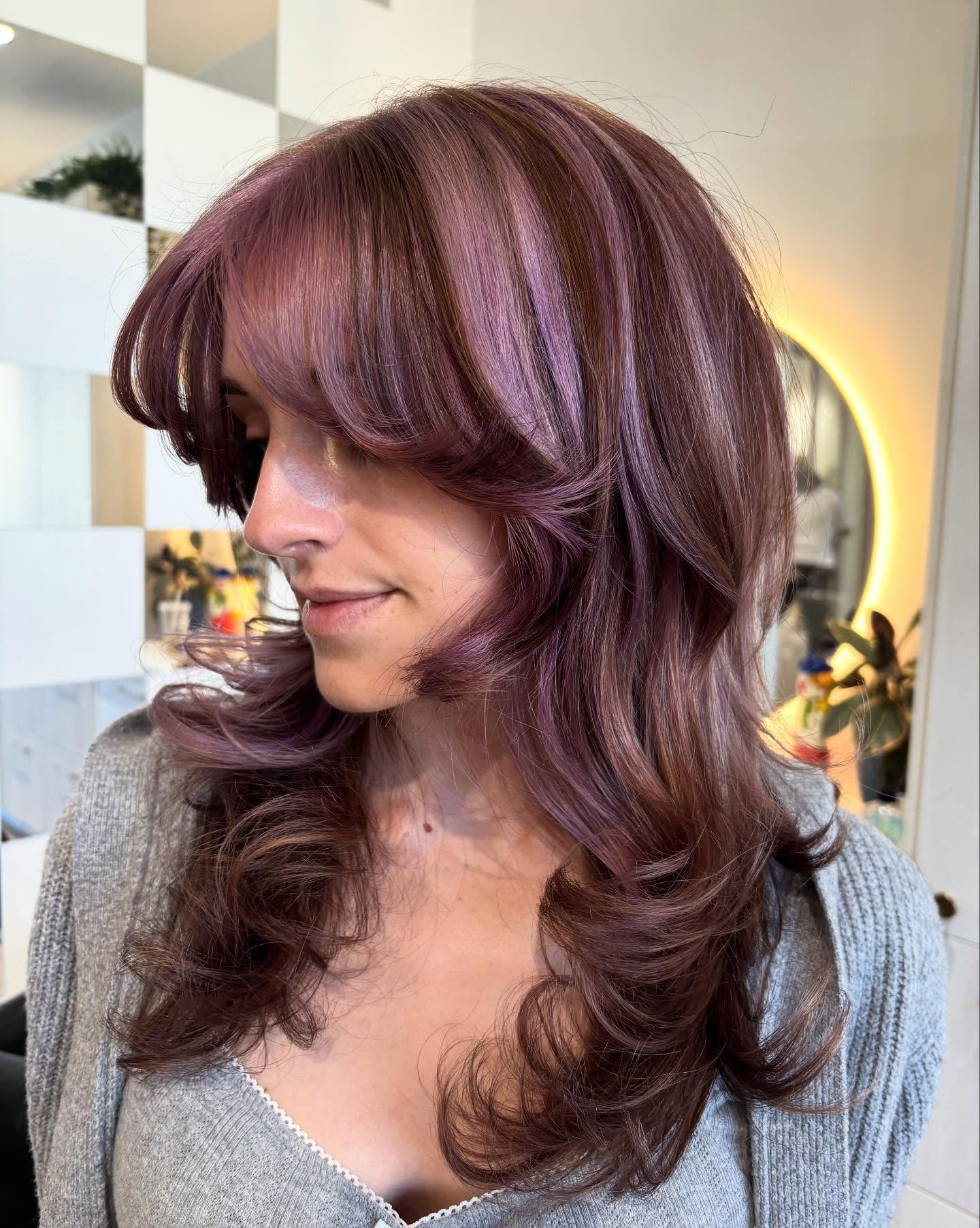 Mauve-Infused Wavy Layers with a Sweeping Fringe