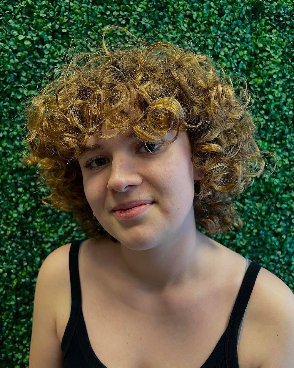 Modern Curly Layered Cut with Bouncy Volume