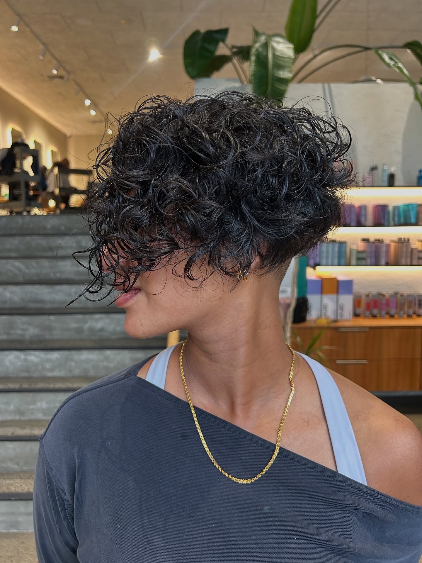 Playful Curly Tapered Pixie with Natural Elegance