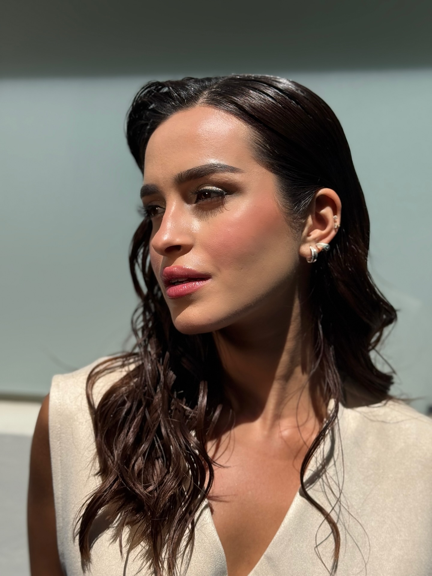 Sculpted Glossy Top with Cascading Textured Waves