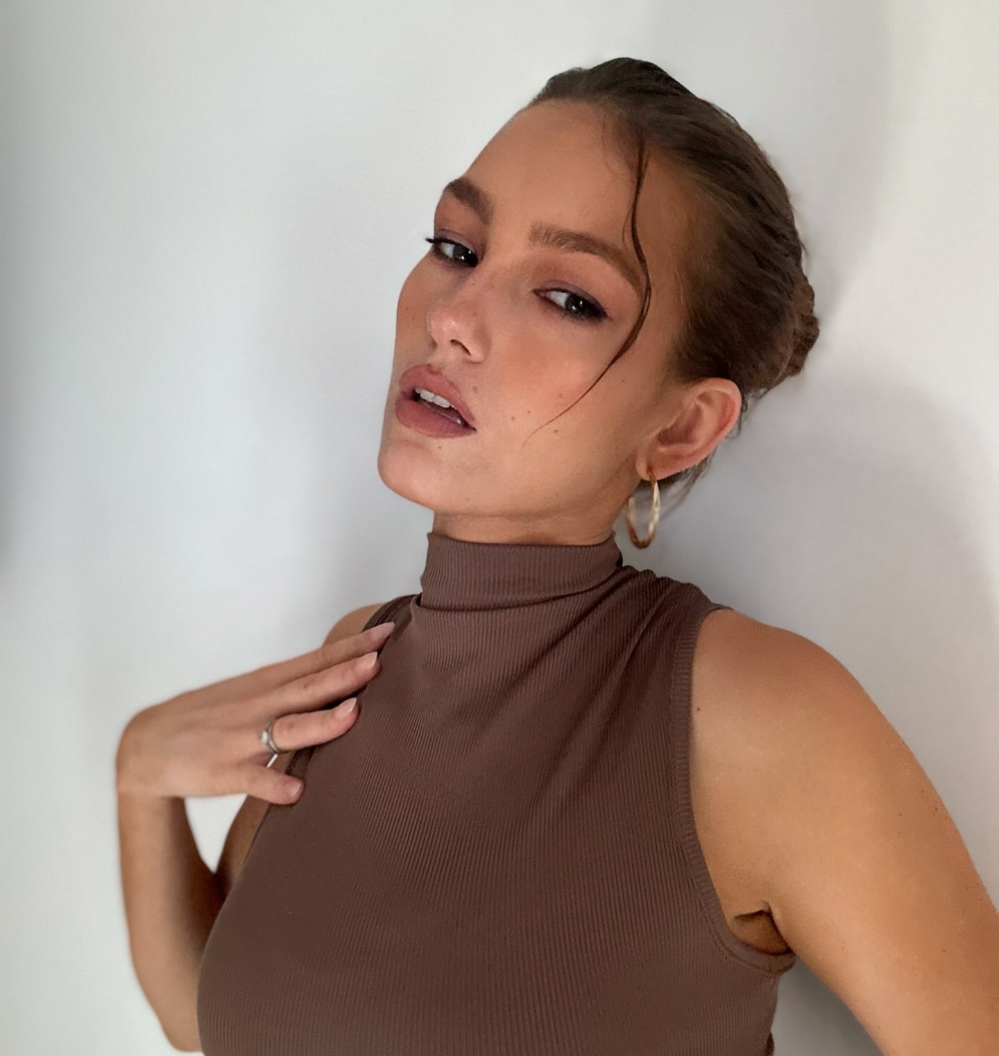 Sleek Brunette Gel-Combed Look