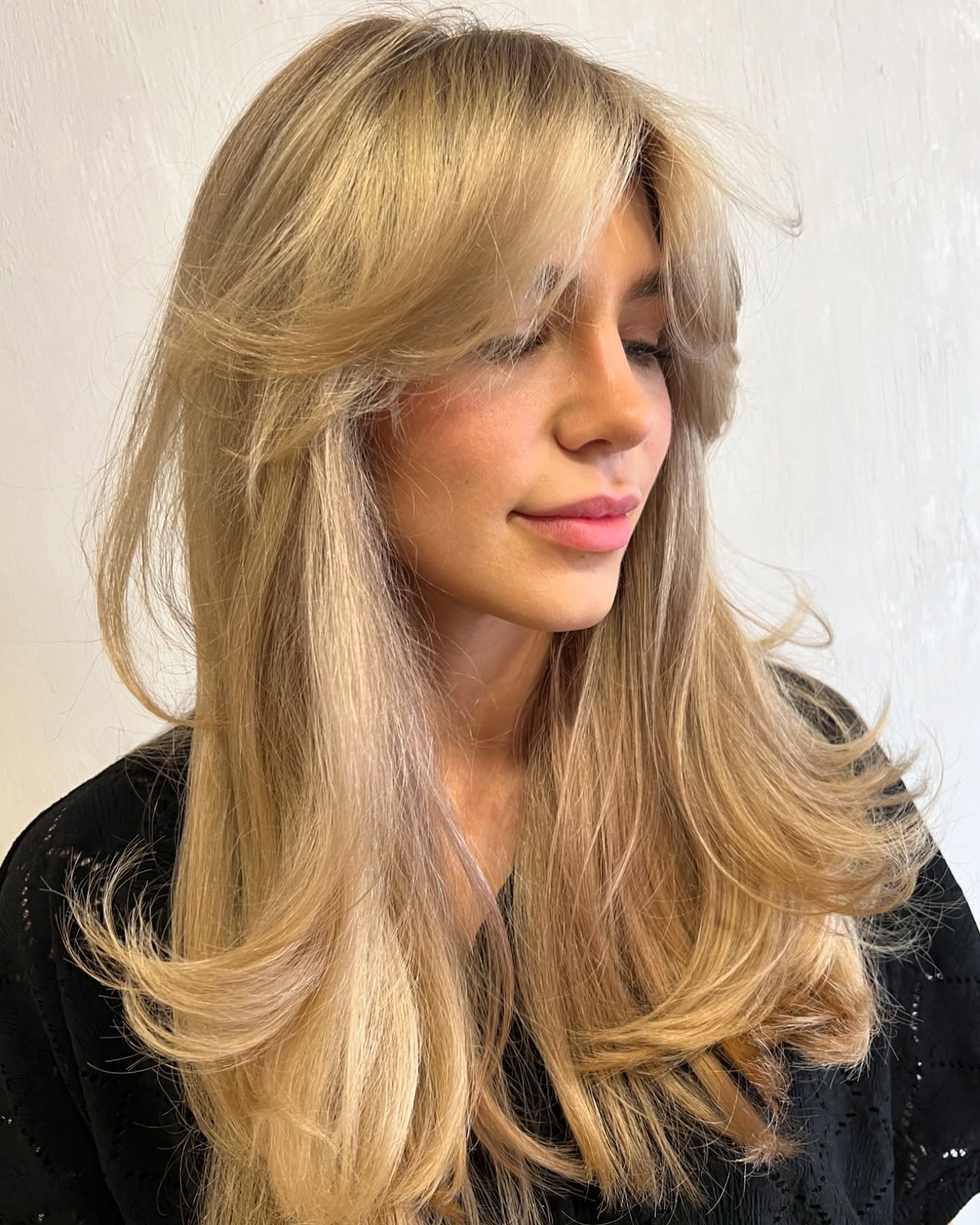 Soft Golden Blonde Layers with Natural Flow